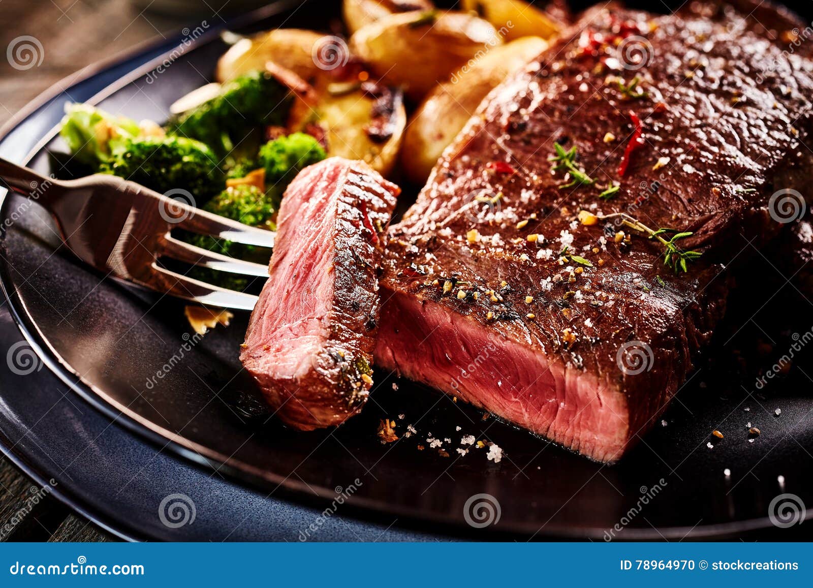 Medium Rare Sliced Grilled Striploin Beef Steak. Barbecue Meat On The