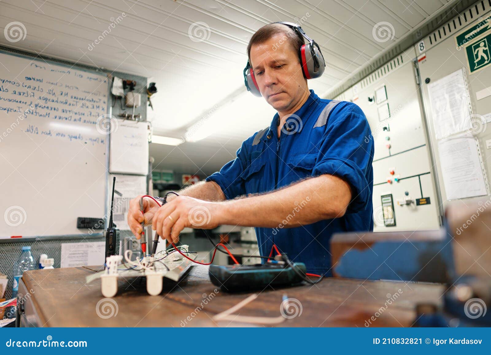 Marine Electrical Engineer Officer in Engine Control Room ECR. he Works