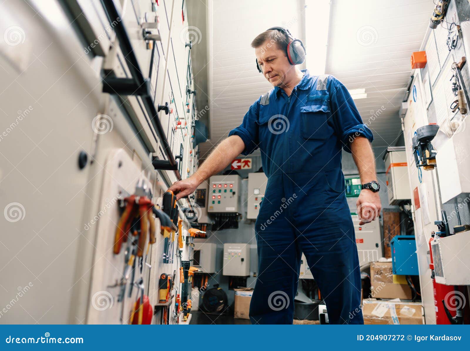 Marine Engineer Officer in Engine Control Room ECR. he Works in