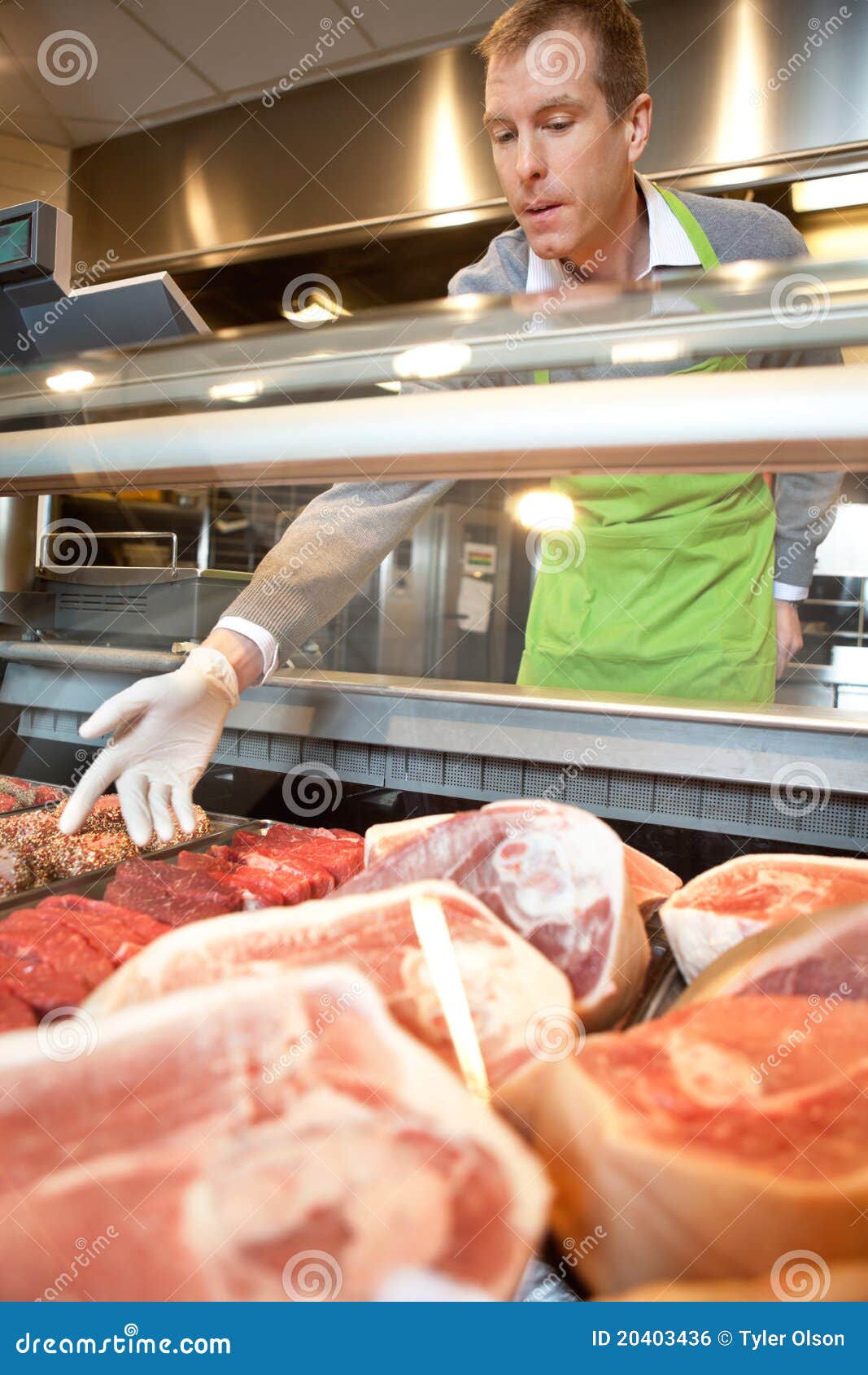 Market Assistant Picking Meat Stock Photo Image of butcher, grocery