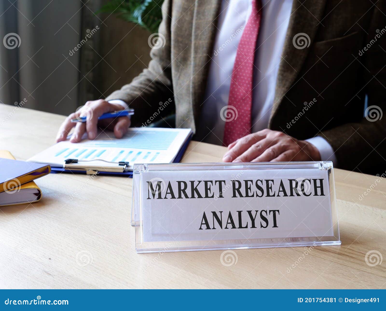 Market Research Analyst Plate on Desk and Worker. Stock Image Image