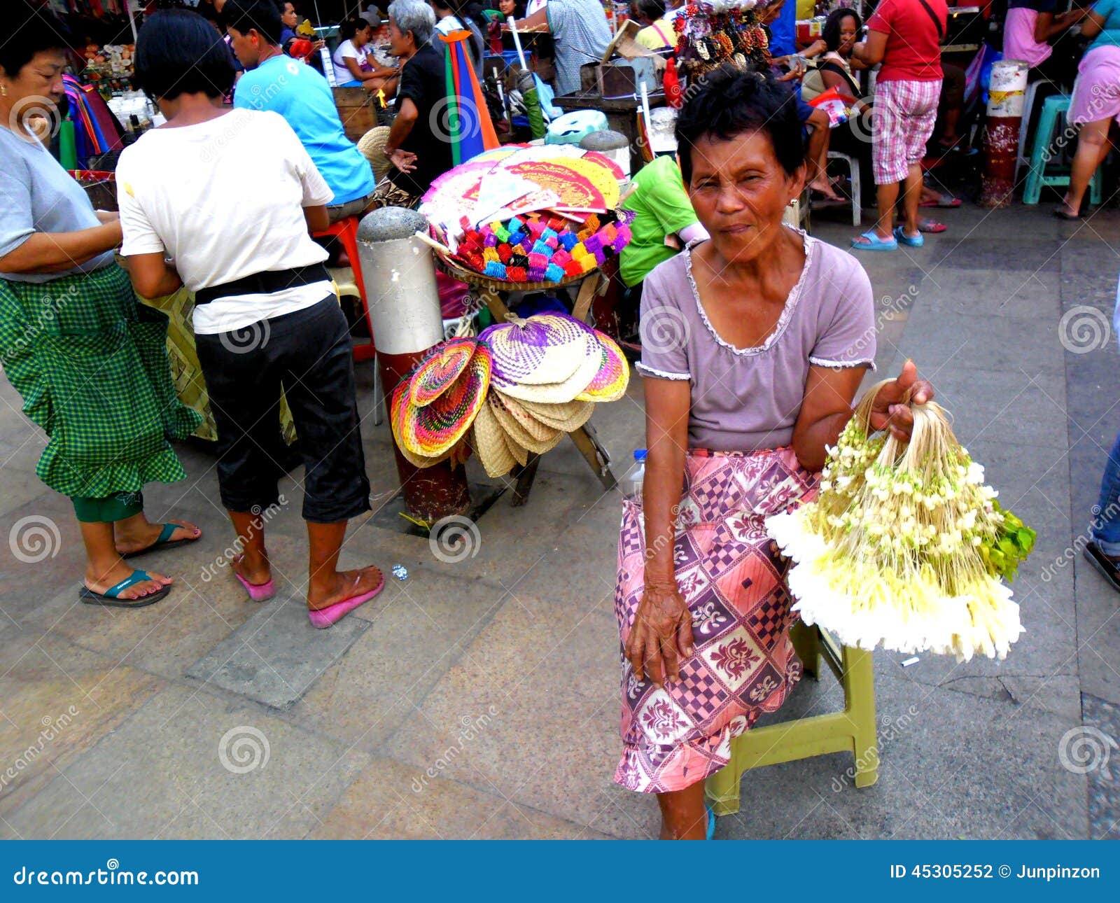 Market Vendor Selling Fruits In A Market In Philippines Editorial Image