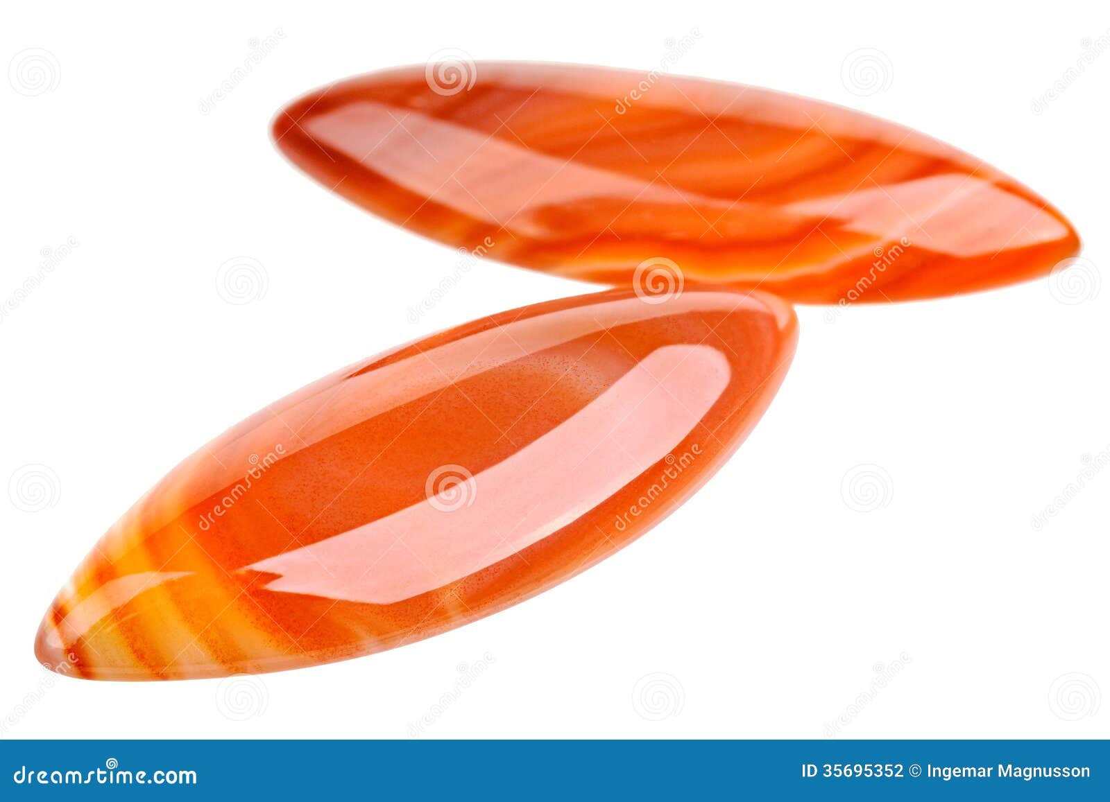 Marquise cabochon Agate pair. A pair of bright orange marquise cut cabochons Agate gemstones.