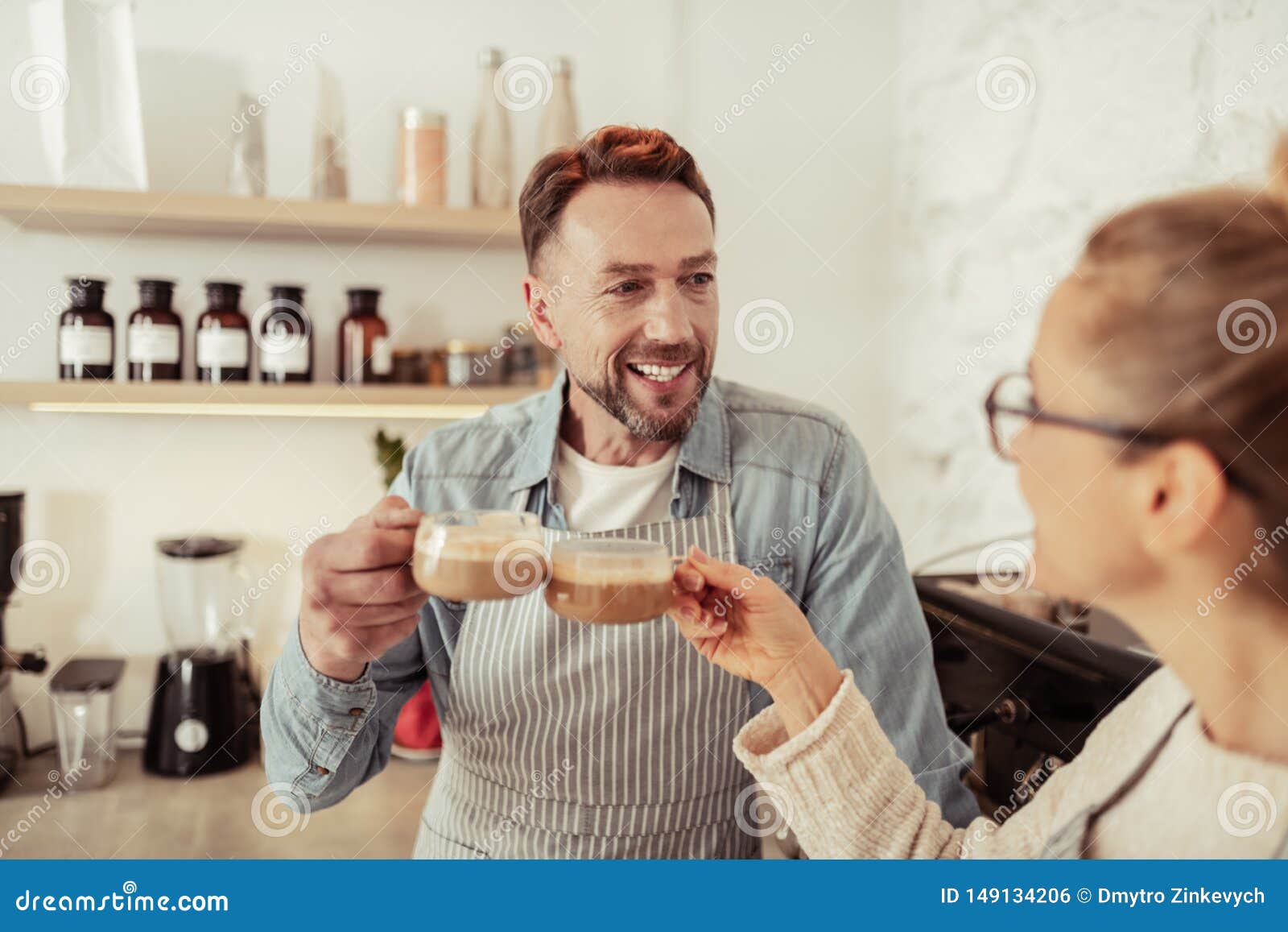 Married Couple Drinking Coffee Together in the Kitchen. Stock Photo ...