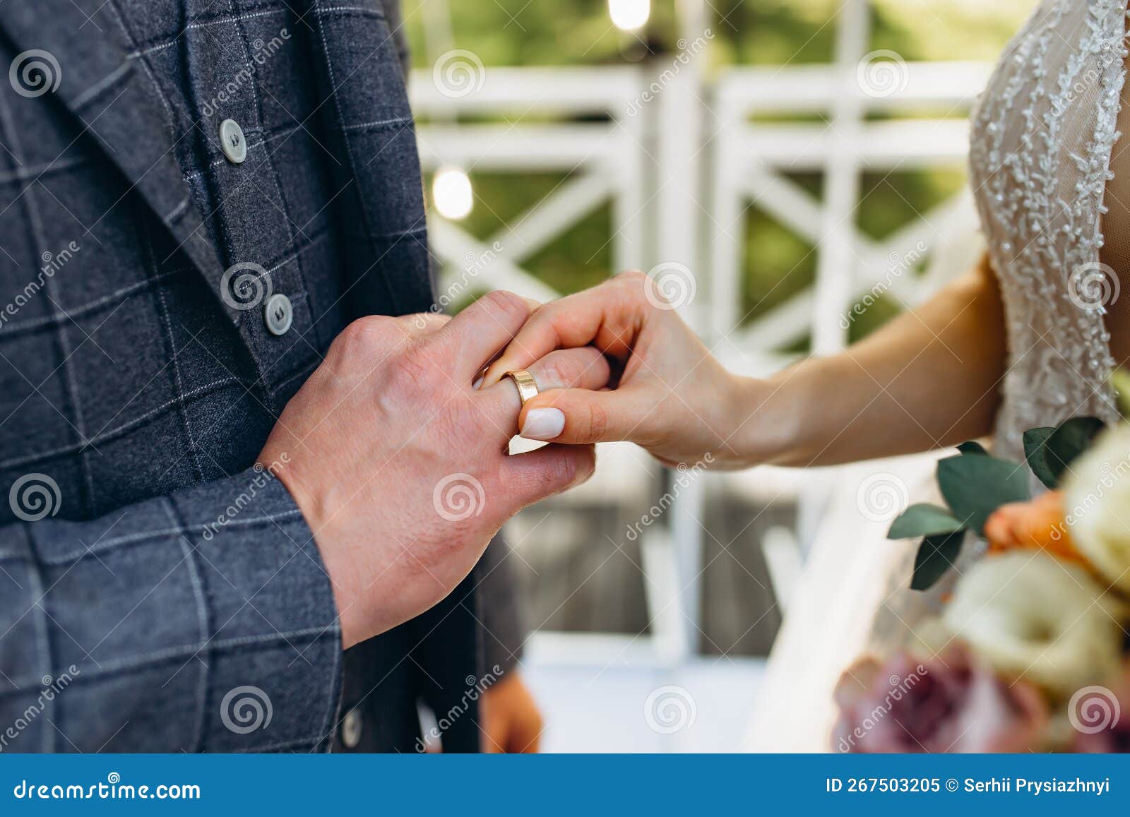 San Jose wedding picture of The couple exchanging wedding rings during  their church ceremony | Wedding Photojournalist Association