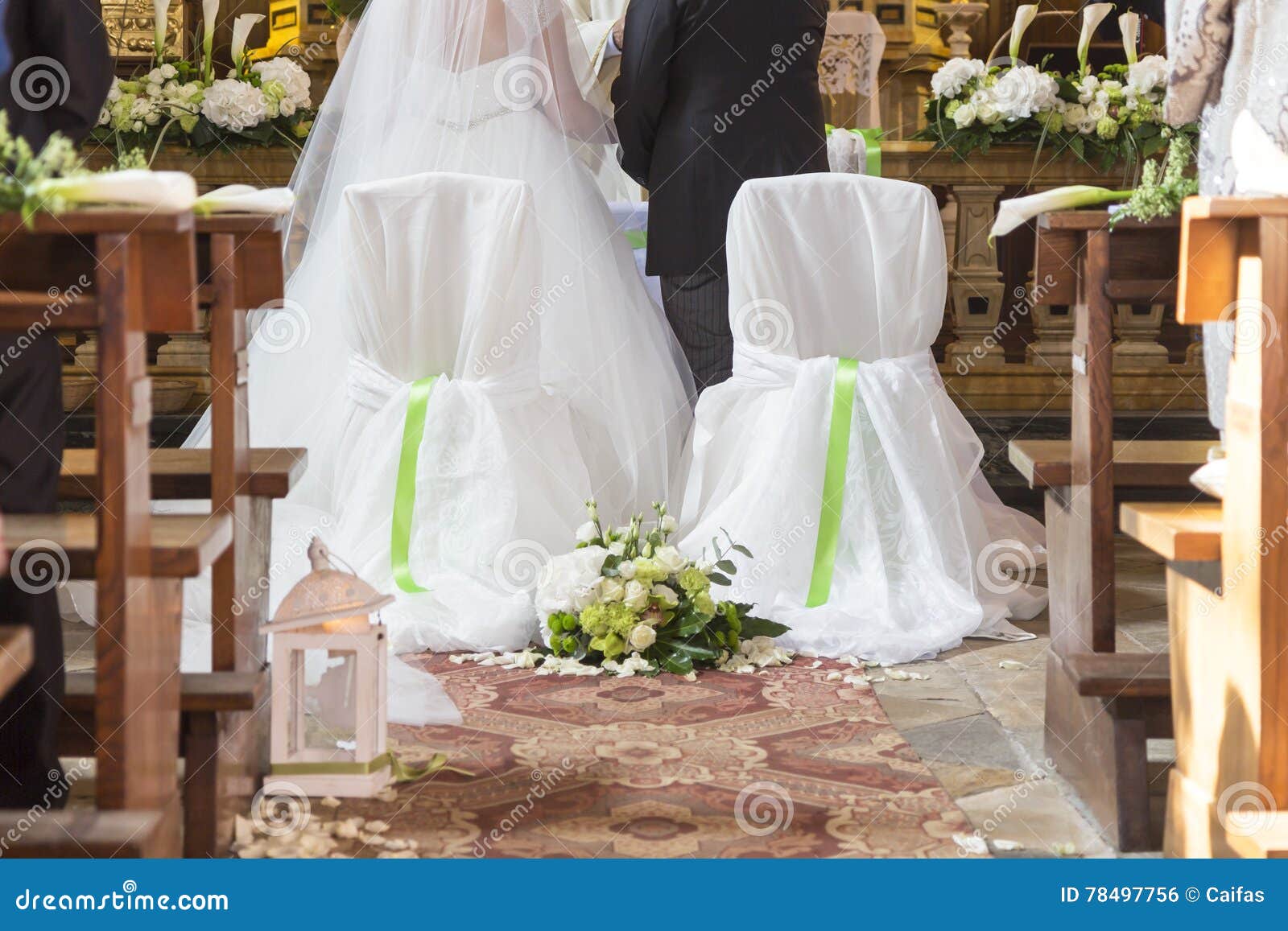 Married Couple In Front Of The Church Altar Stock Photo
