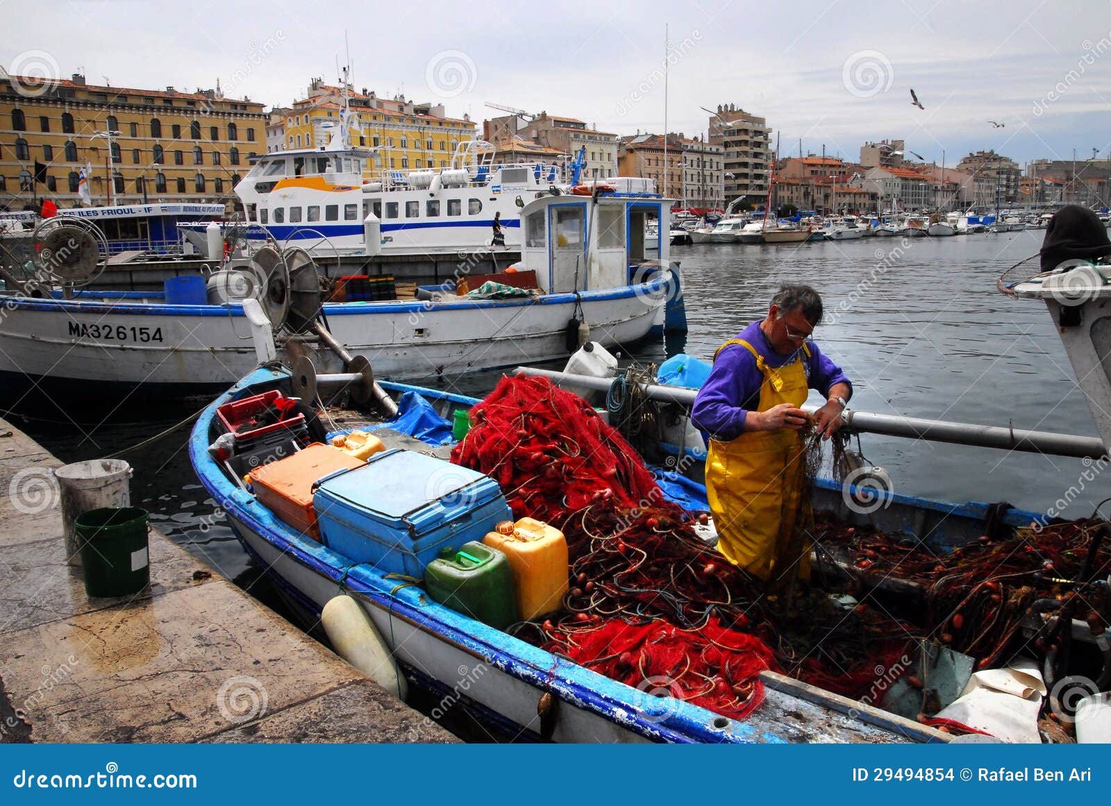 Marseille - France. MARSEILLE - MAY 09:Fishing boat at Vieux-Port on May 09 2008 in Marseille,France.Marseille is France s largest city on the Mediterranean coast and largest commercial port.