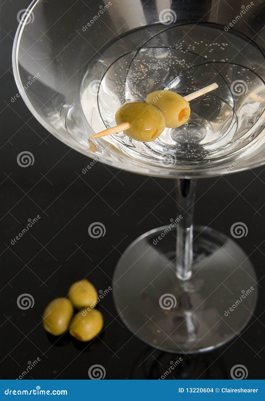 Martini Glass with olives stock photo. Image of olive 13220604