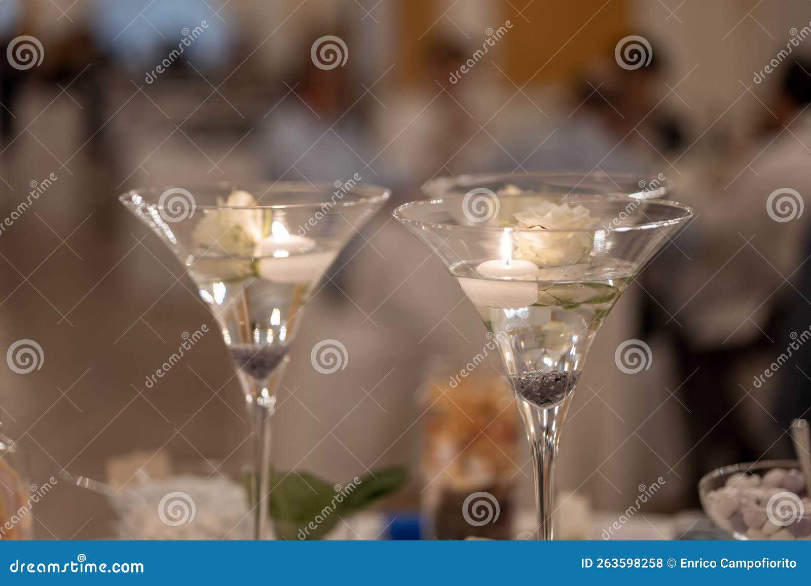 martini glass wedding centerpiece with candles and roses