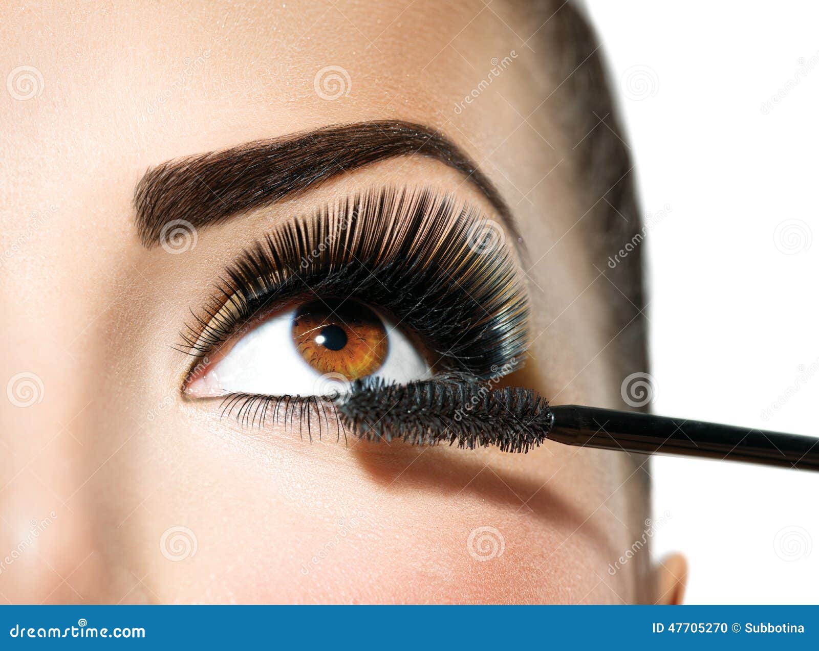 mascara applying. long lashes closeup
