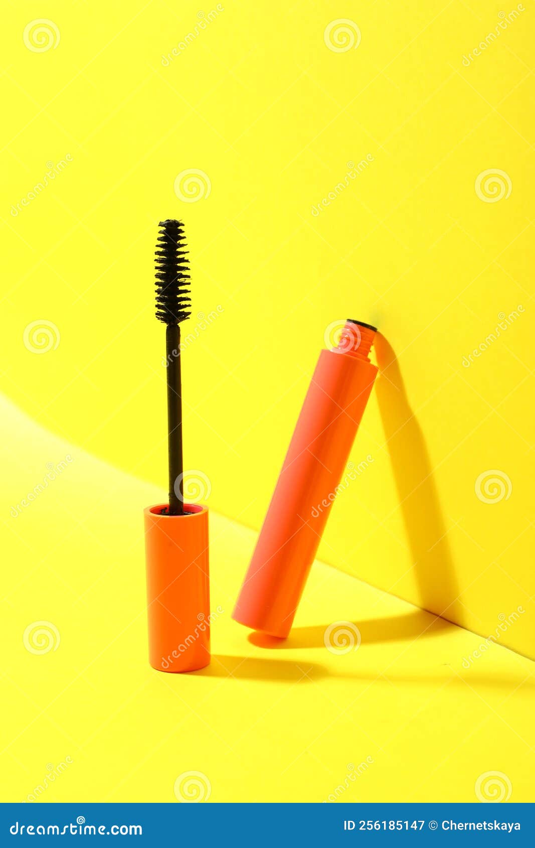 Mascara for Eyelashes on Yellow Background. Makeup Product Stock Image