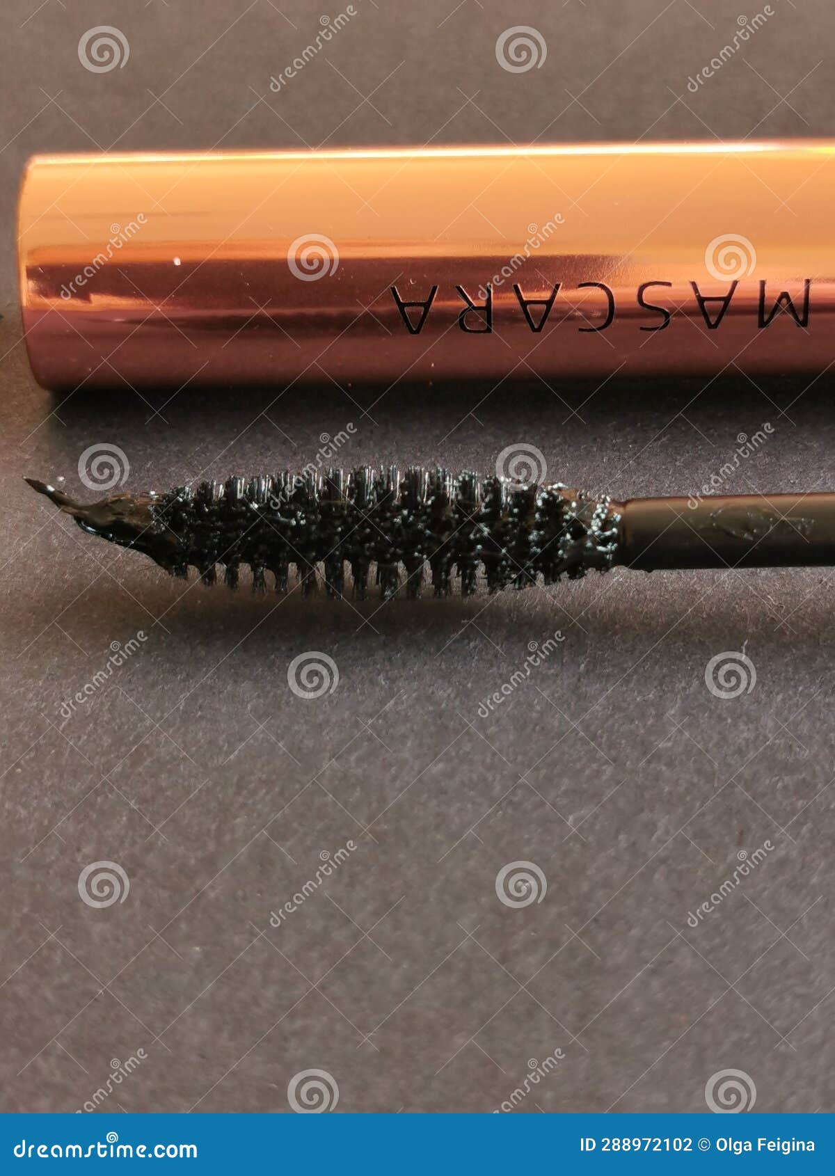 Mascara in a Gold Case on a Black Background. Stock Photo Image of