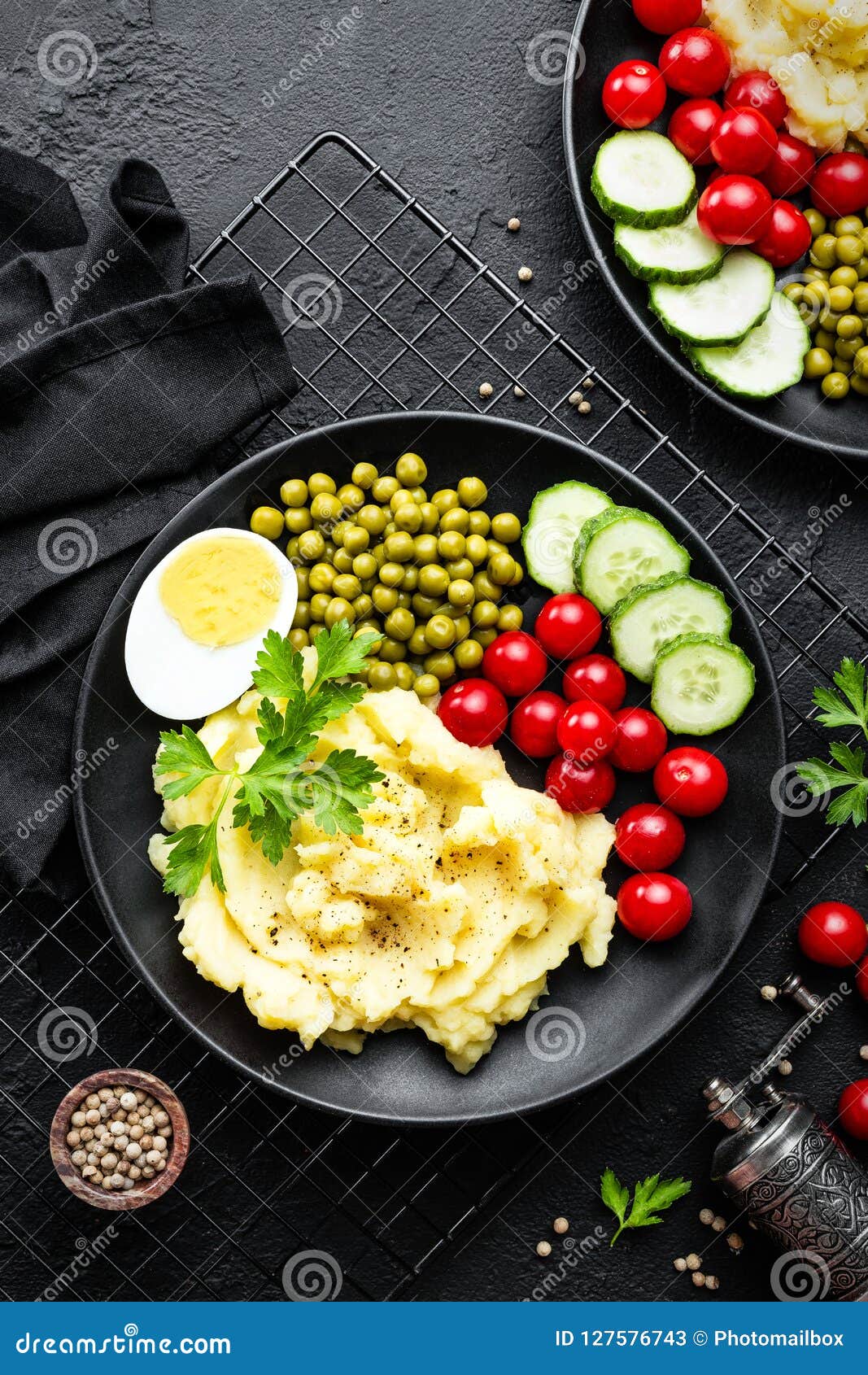 Mashed Potato with Green Peas, Tomatoes and Boiled Egg. Potato Puree on