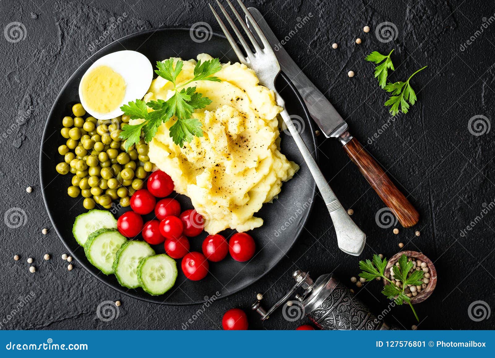 Mashed Potato with Green Peas, Tomatoes and Boiled Egg. Potato Puree on
