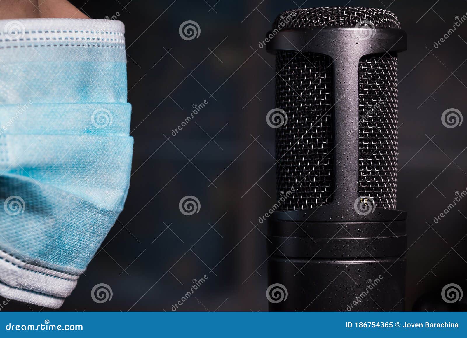 Performer Wearing Face Mask in Front of Microphone Stock Image Image