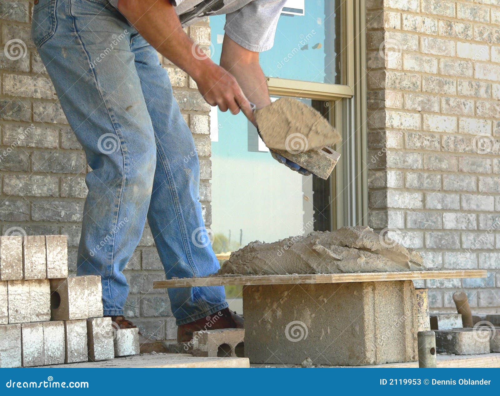 Mason applies mortar stock image. Image of masonry, mason 2119953