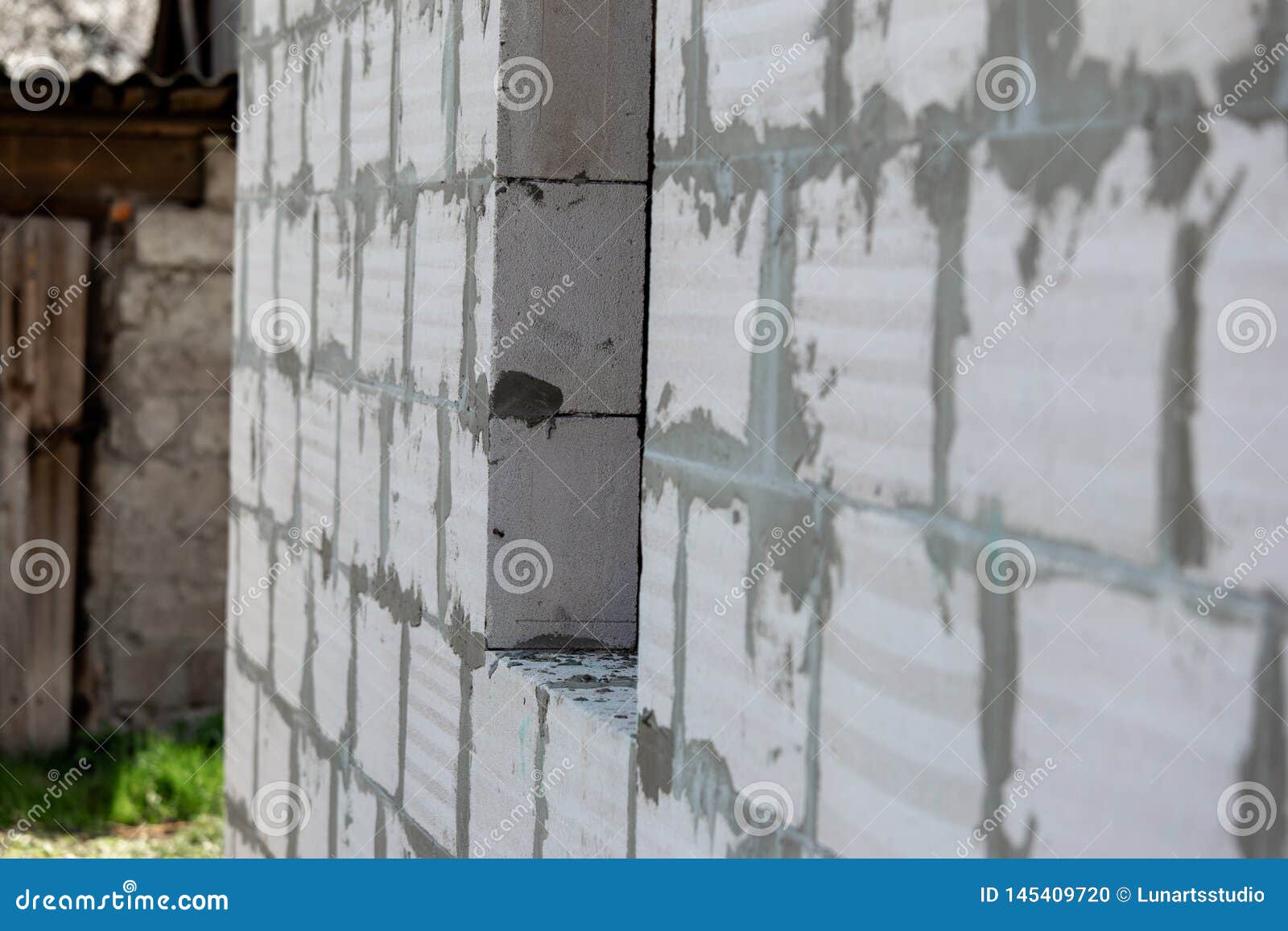 Masonry or Bricklaying Work. the Concrete Blocks for Wall in the