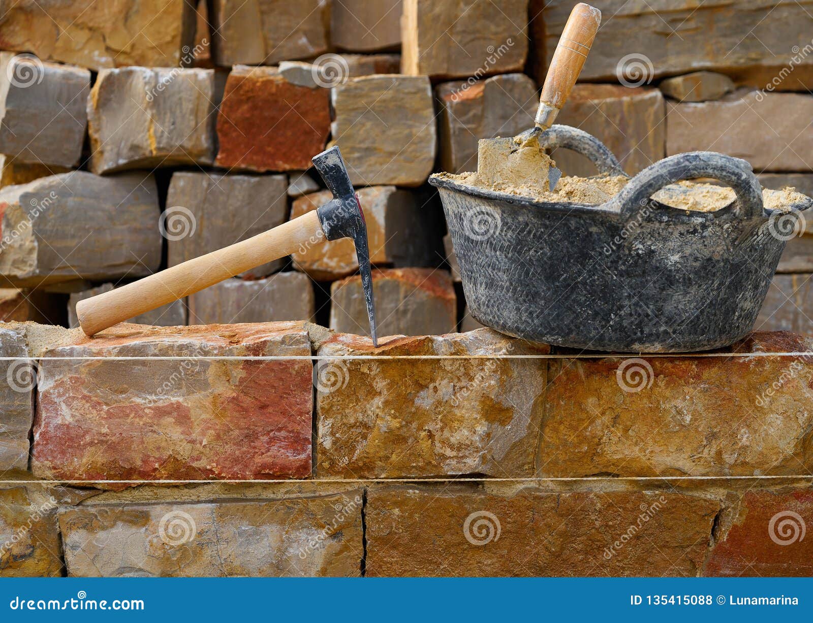 Masonry Stone Wall Construction with Tools Stock Photo Image of