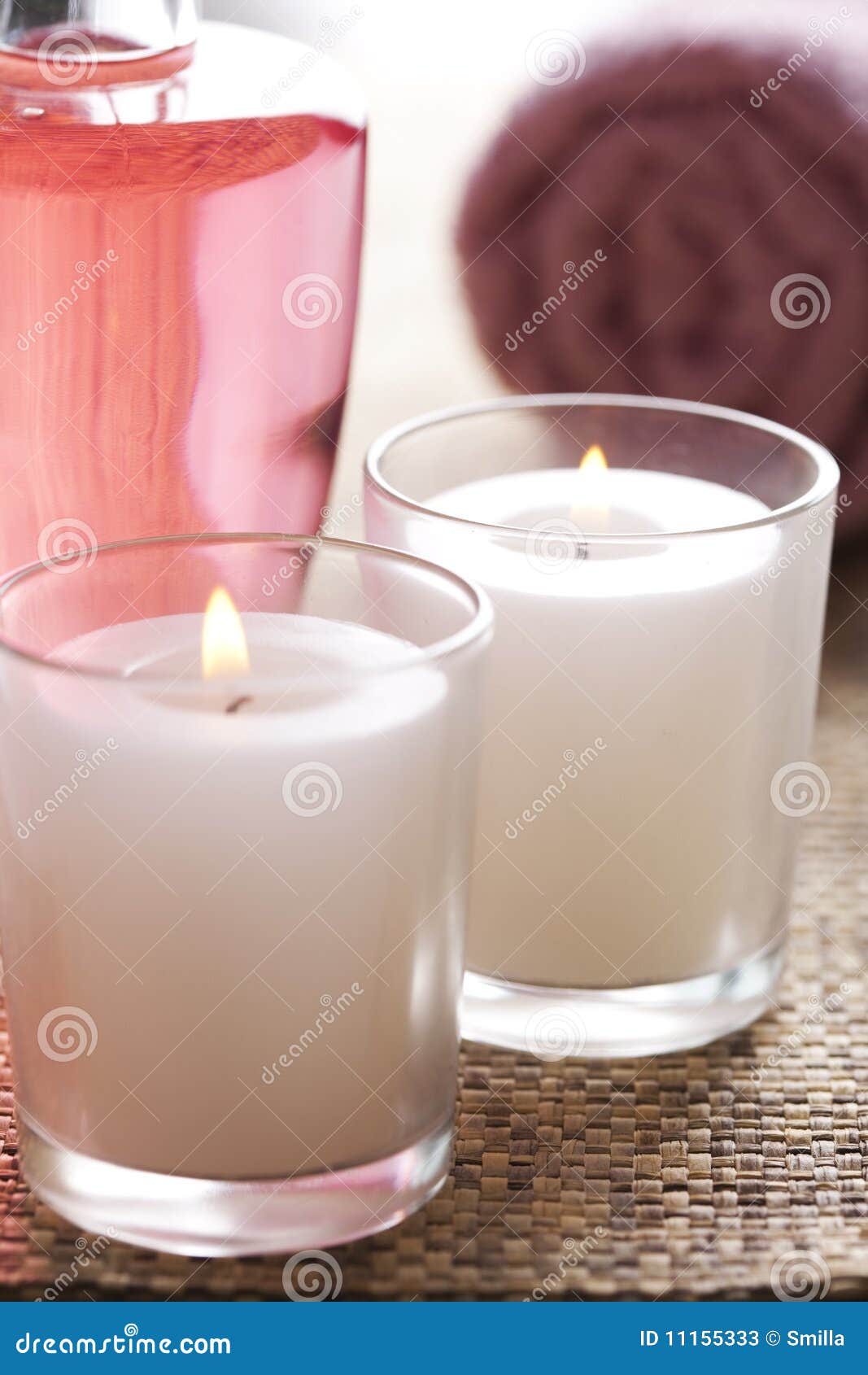 Massage oil and candles stock image. Image of packshot 11155333