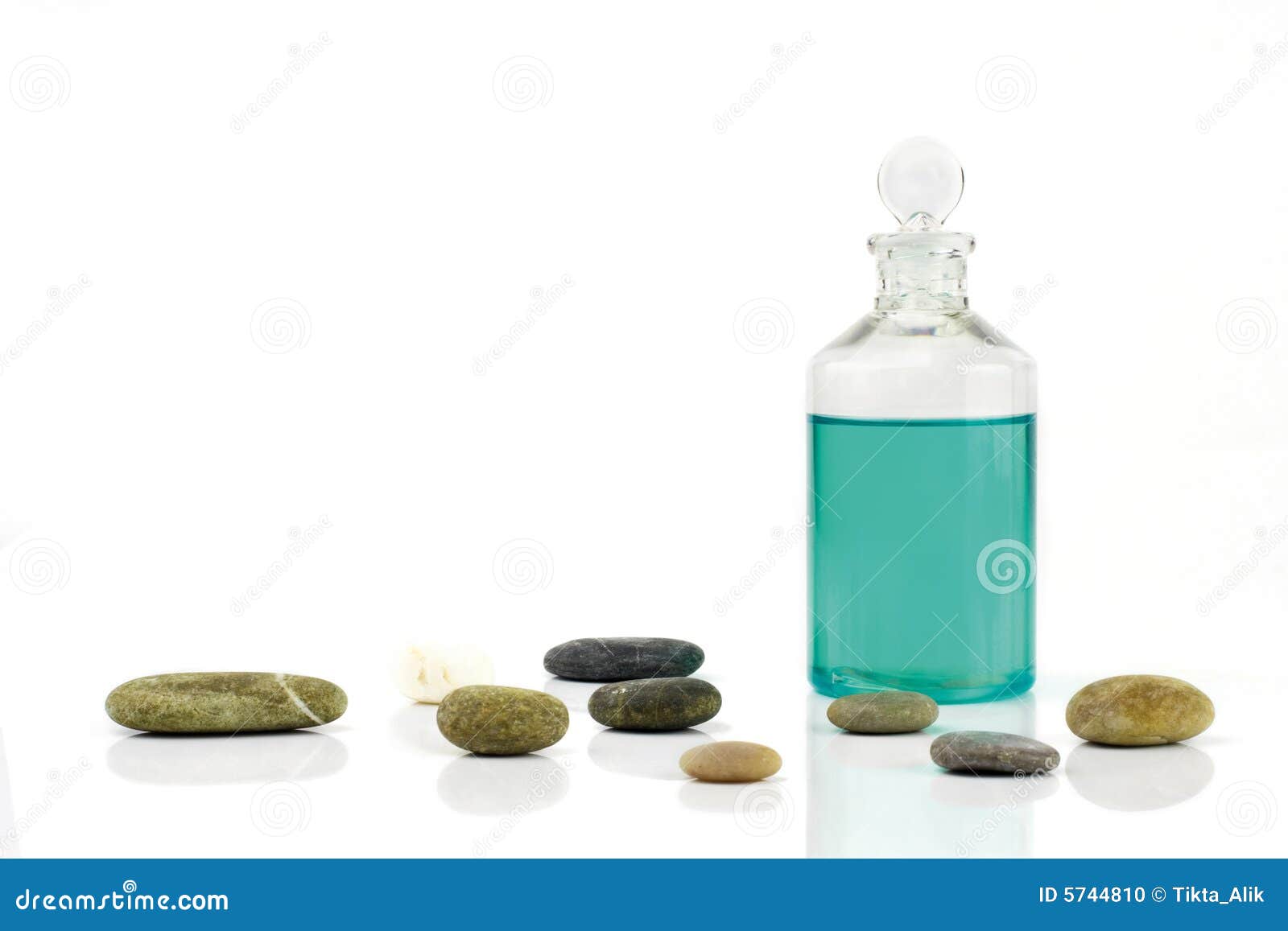 Massage oil and stones stock photo. Image of products 5744810