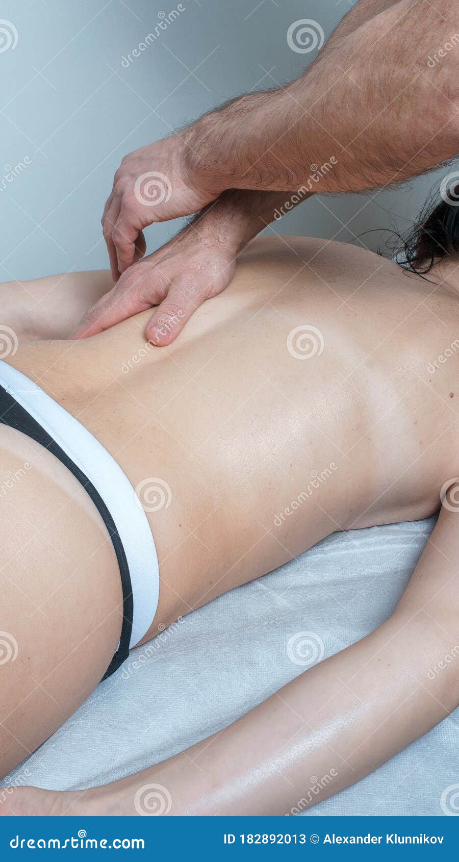 The Massage Process. Masseur`s Masculine Hands Soaked in Oil Knead the  Female Body. Close-up Stock Image - Image of female, aspect: 182892013