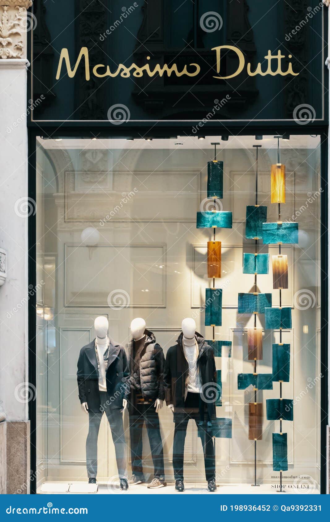 Massimo Dutti Logo and Showcase of Luxury Fashion Shop in Milan. Three Male  Mannequins Standing in Store Display. Milan Editorial Photography - Image  of modern, display: 198936452