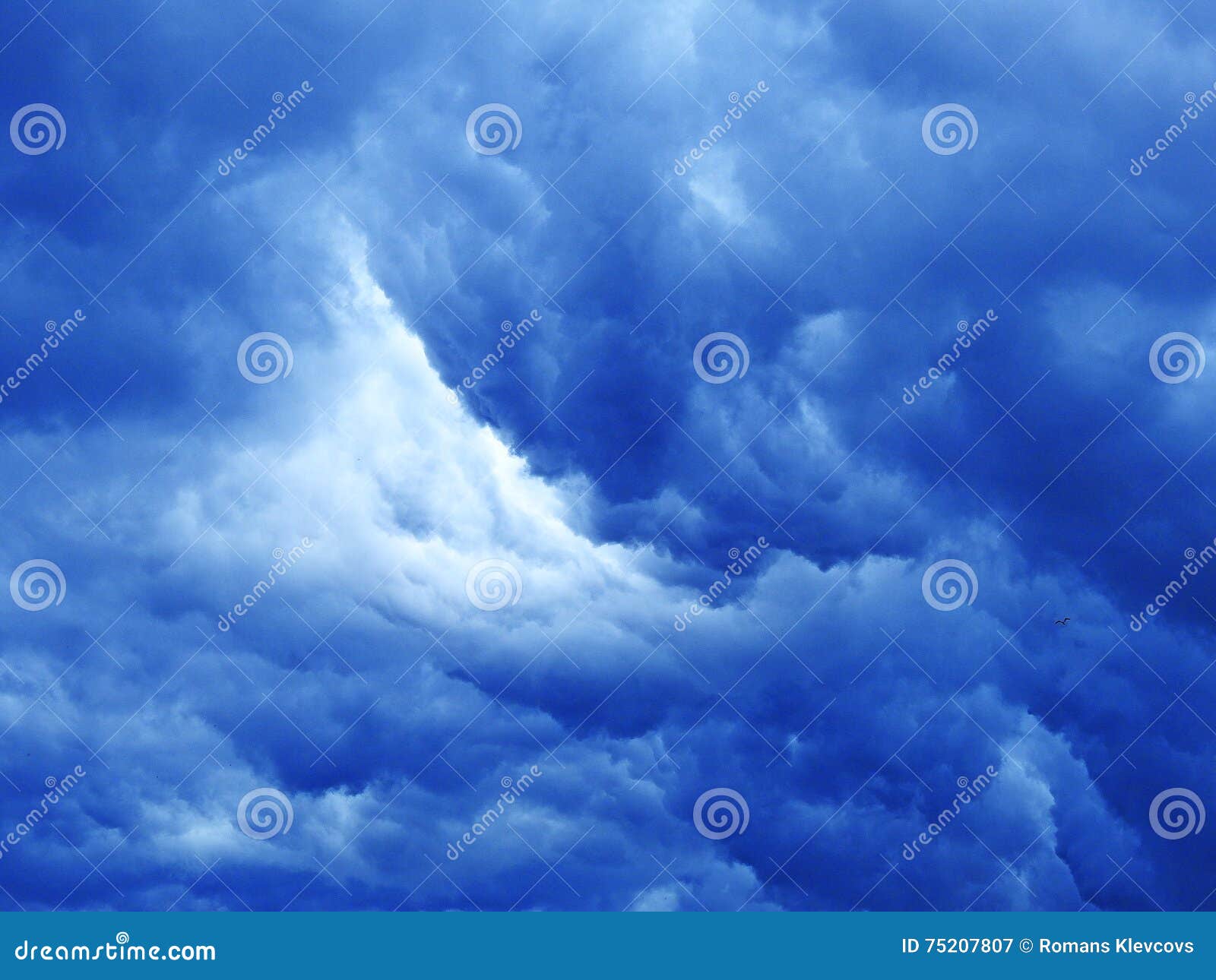 Massive dark blue clouds. stock image. Image of moody 75207807