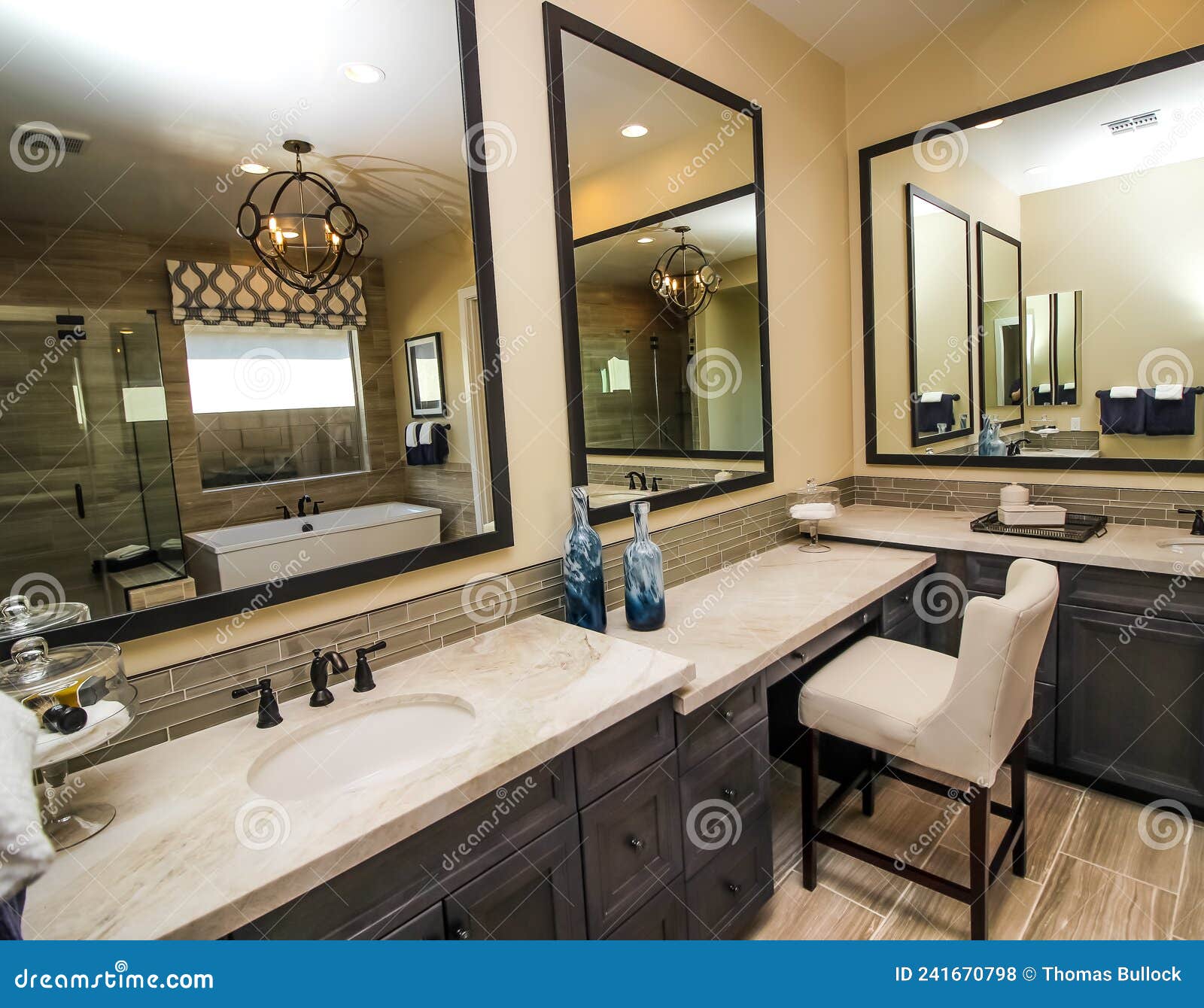 Master Bathroom with Dual Vanities Stock Photo Image of indoor, chair
