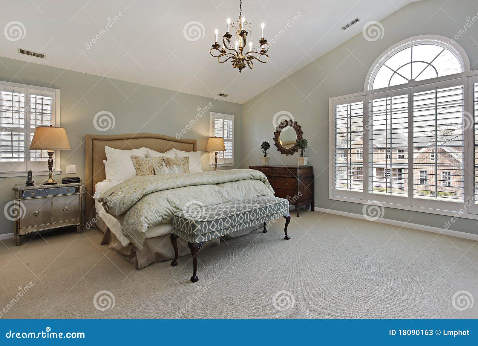 master bedroom with circular window