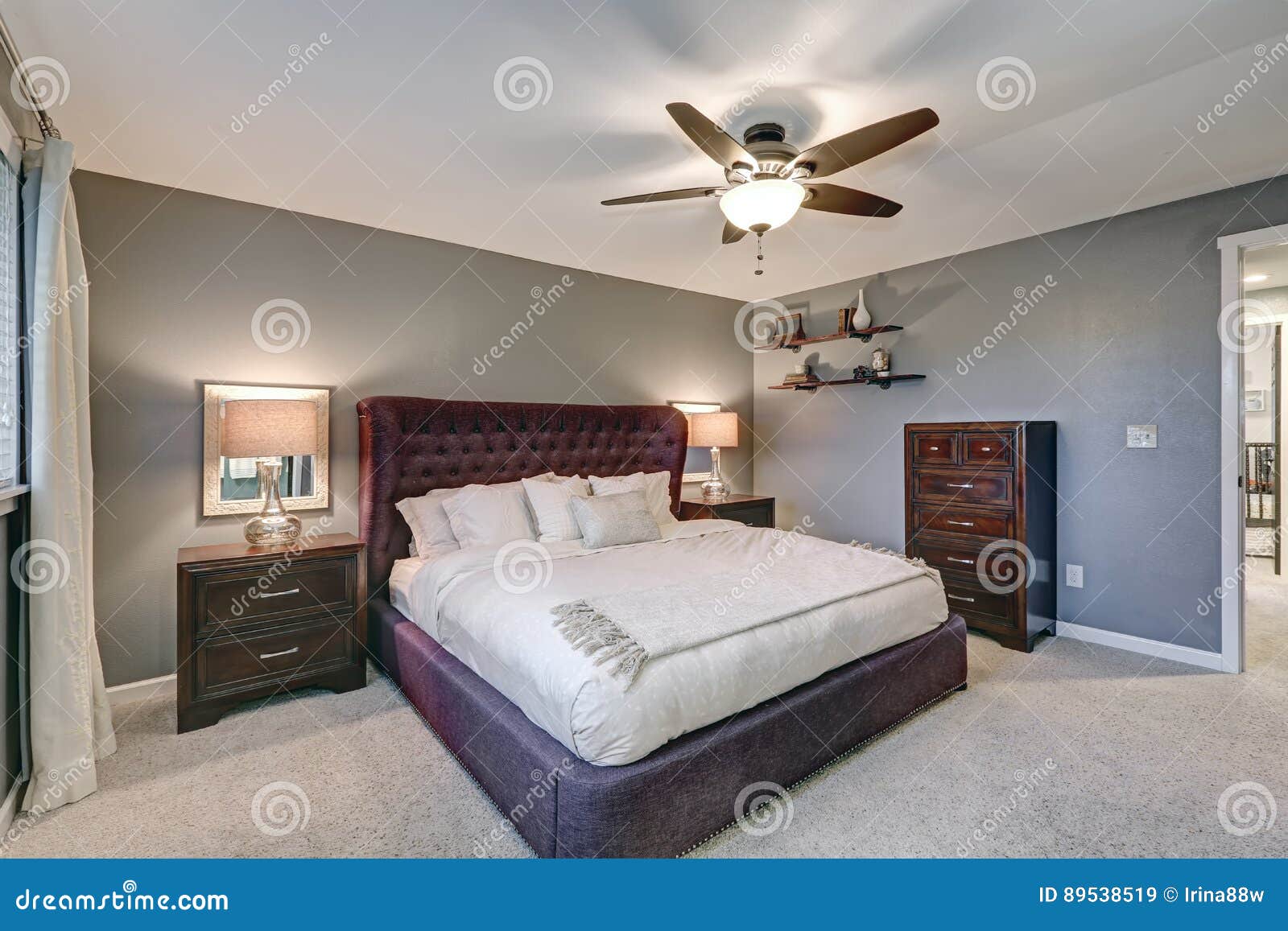 Master Bedroom Suite With Gorgeous Queen Size Bed Stock