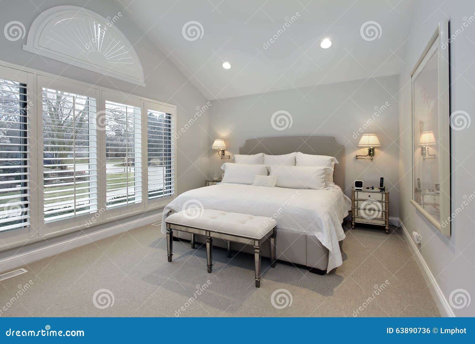 master bedroom with wall of windows
