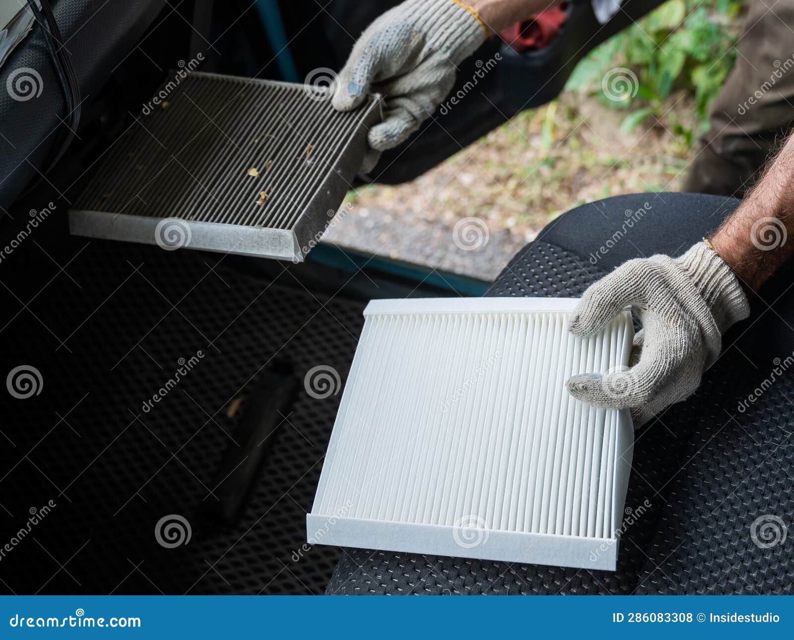 The Master Changes the Cabin Air Filter of the Car. Stock Photo Image of automobile, vehicle