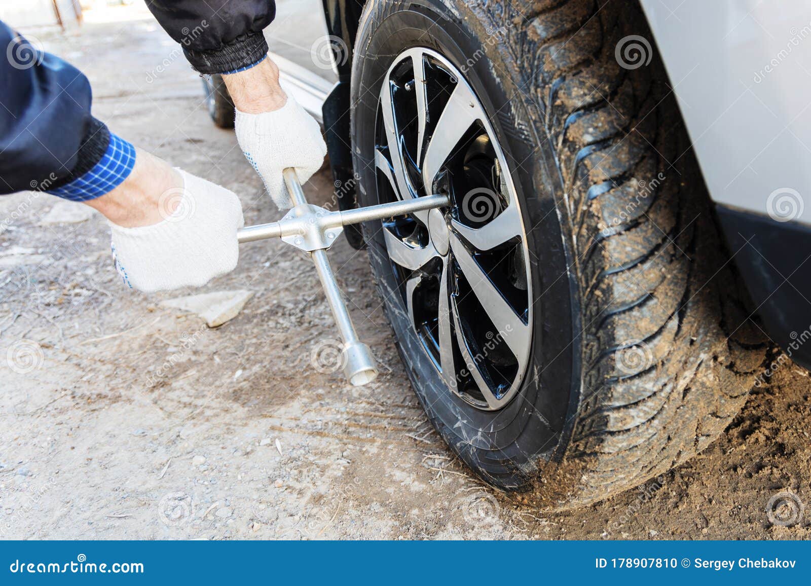 Master Changes the Wheel of a Car Stock Photo Image of phillips