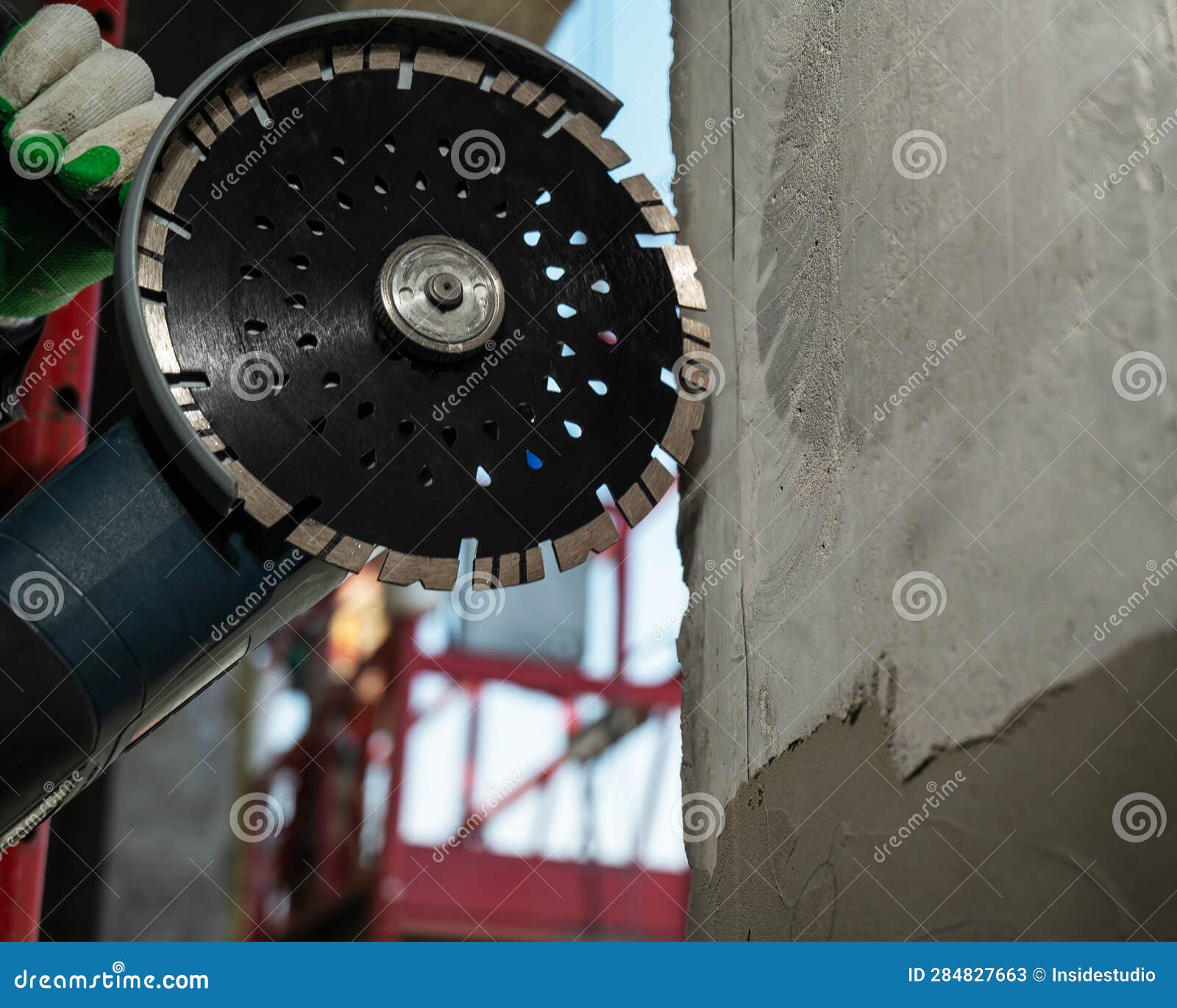 Master Cuts a Concrete Wall with a Circular Diamond Saw. Stock Image