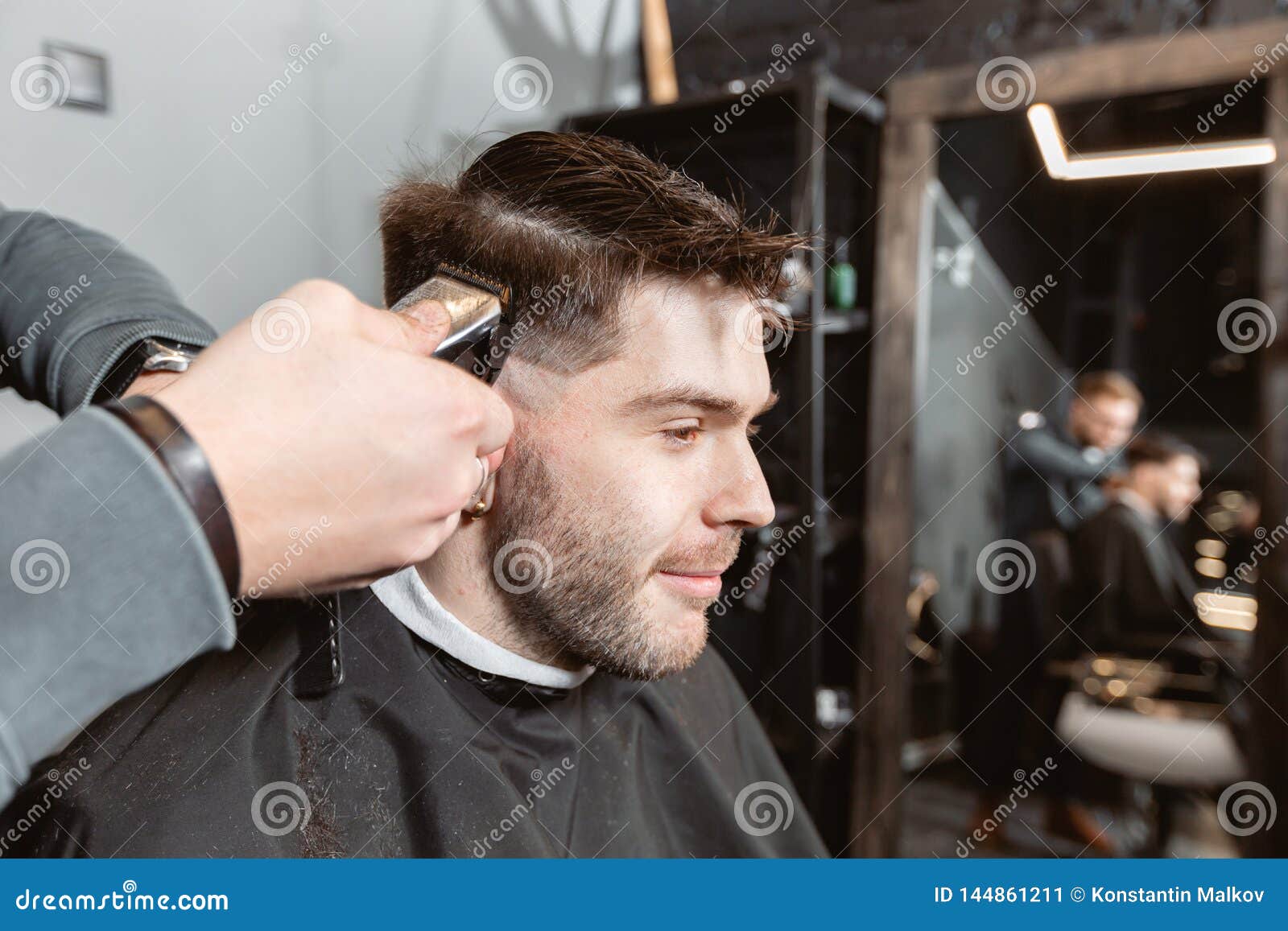 Master Cuts Hair and Beard of Men in the Barbershop, Hairdresser Makes Hairstyle for a Young Man. Barber Work with Stock Image - Image of modern, beautician: 144861211 Master Cuts Hair and Beard of Men in the Barbershop, Hairdresser Makes Hairstyle for a Young Man. Barber Work with Stock Image - Image of modern, beautician: 144861211