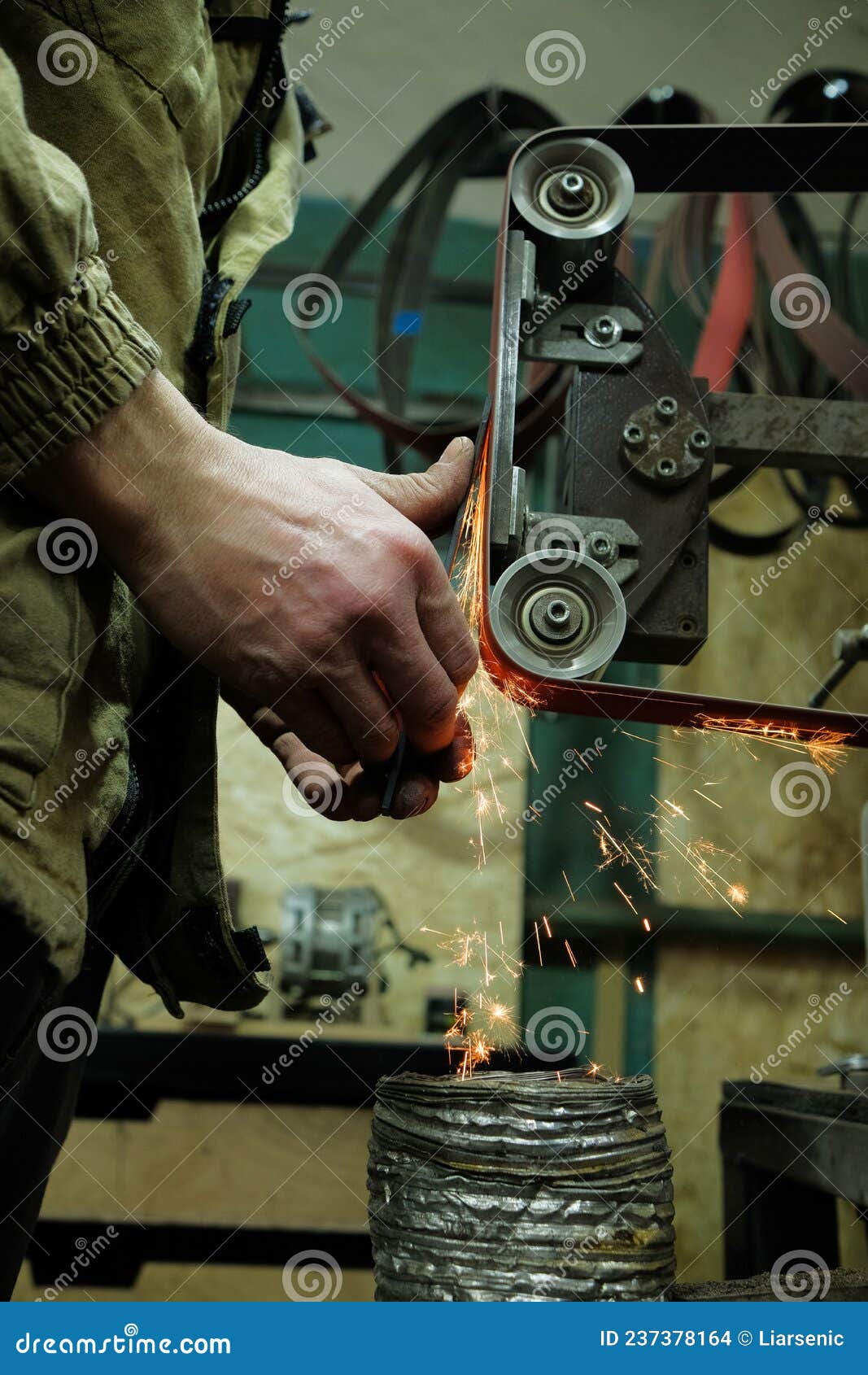 Sparks Grinding Wheel while Knife Sharpening. Stock Photo Image of