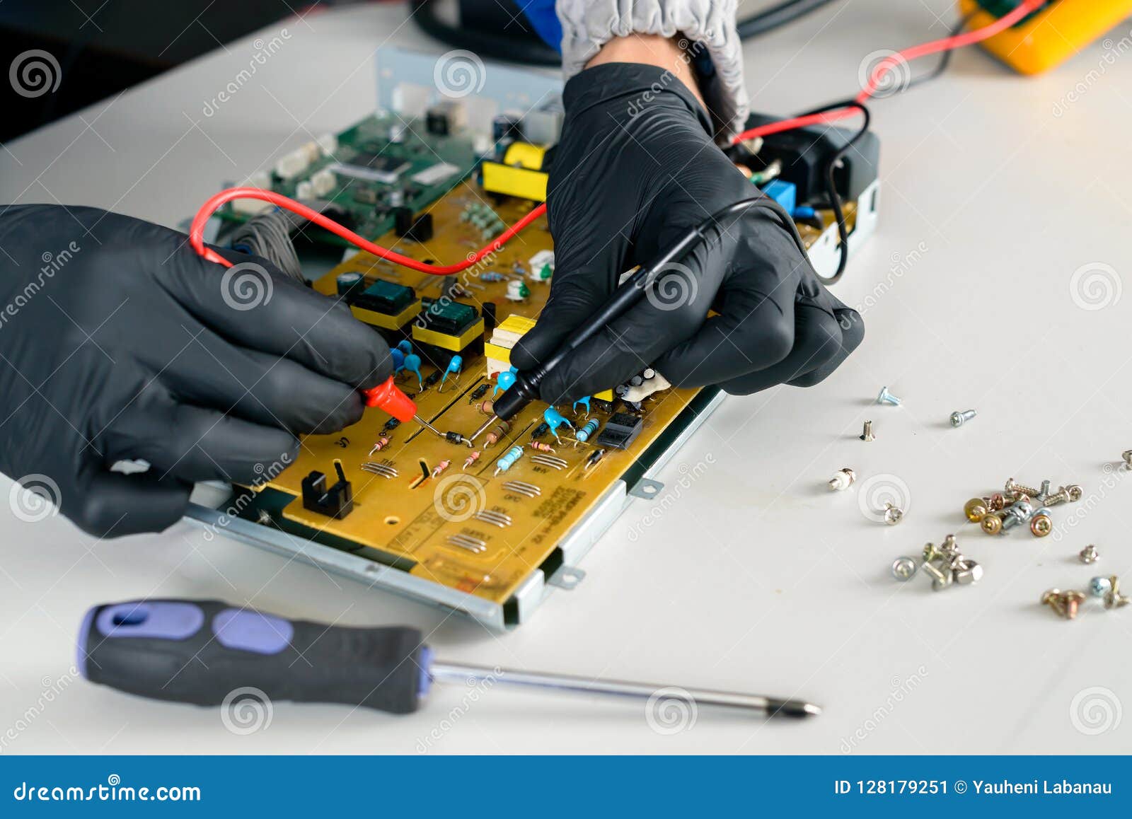 Master is Looking for Damage, Repair Office Equipment Using Multimeter