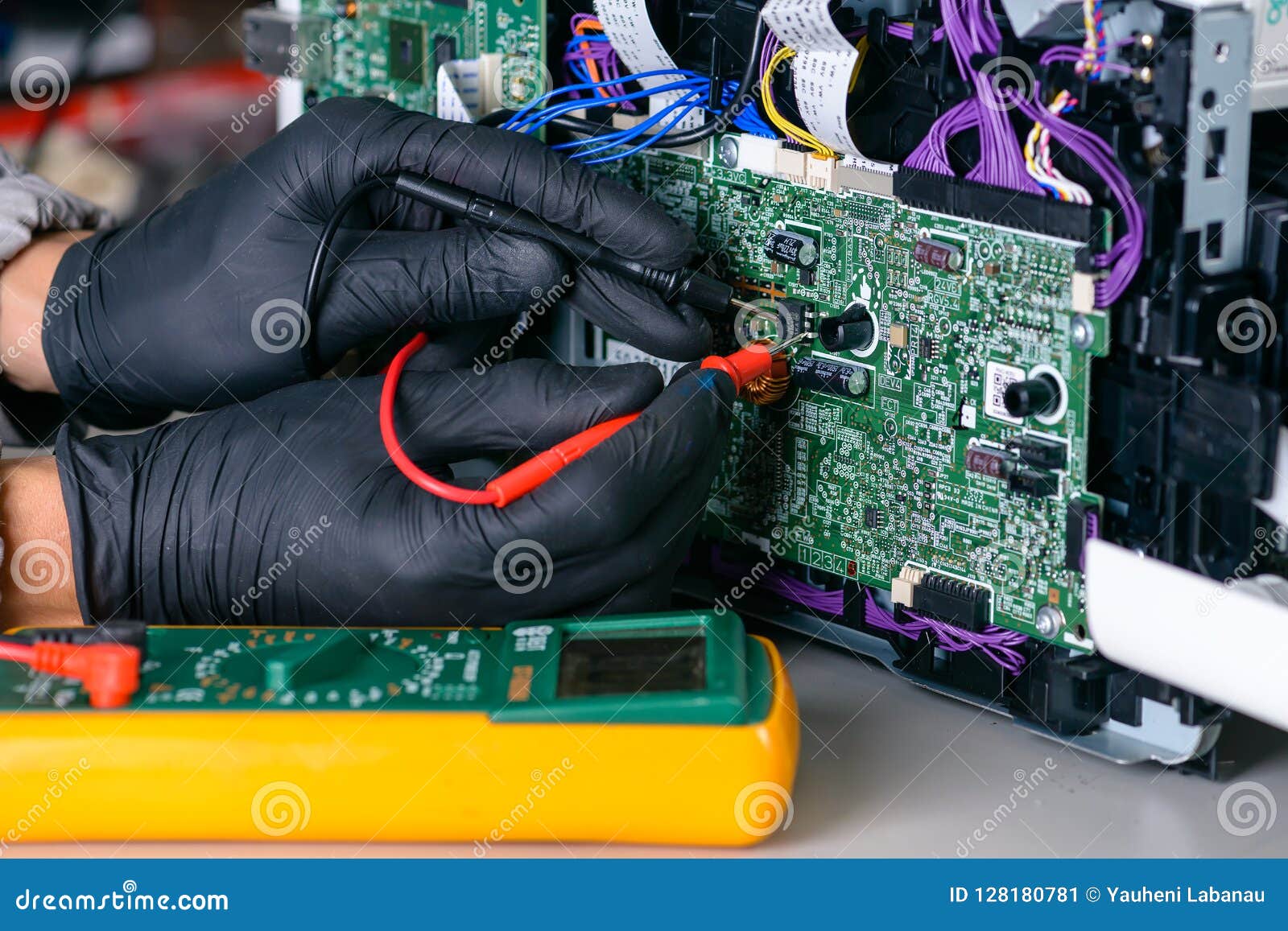 Master is Looking for Damage, Repair Office Equipment Using Multimeter