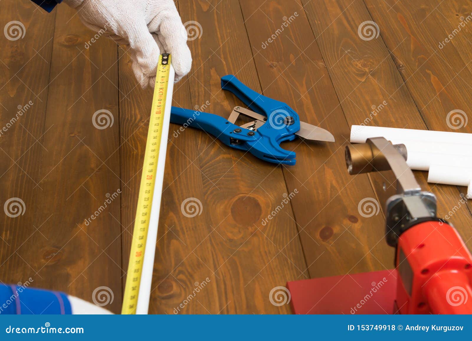 The Master Measures The Size Of Fitting Using Caliper Before Connecting