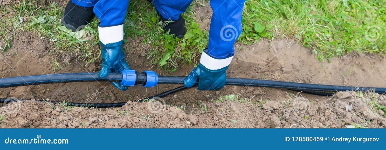 Master Puts a Black Pipe in the Ground, Long Stock Image Image of
