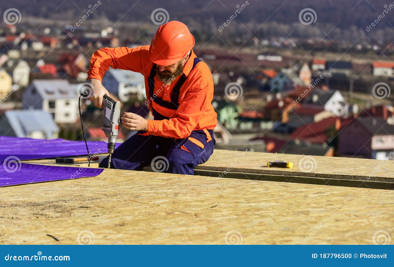 Master Repair Roof. Flat Roof Installation. Roofer Constructing Roof