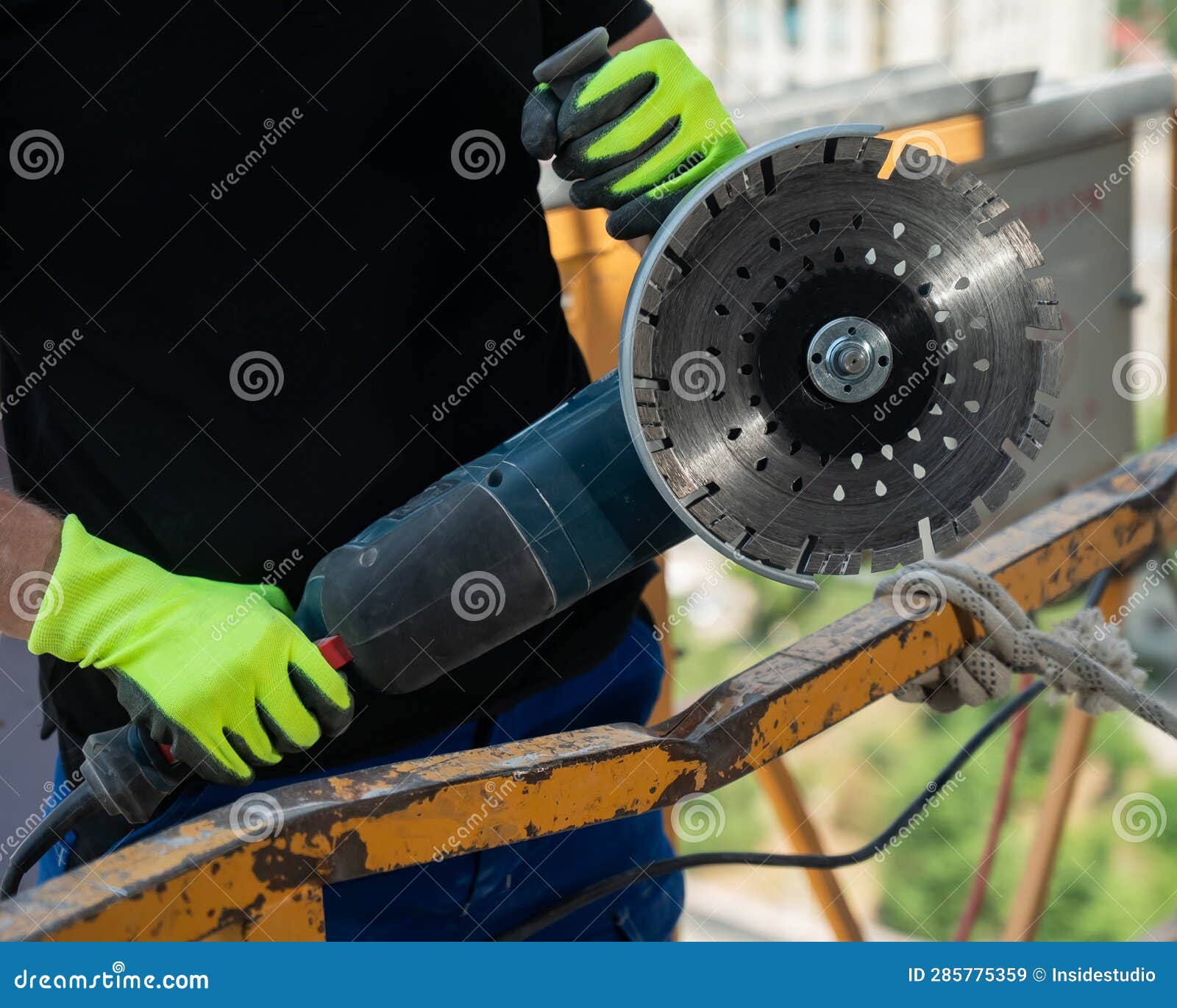 The Master Uses a Diamond Blade at a Construction Site. Stock Image