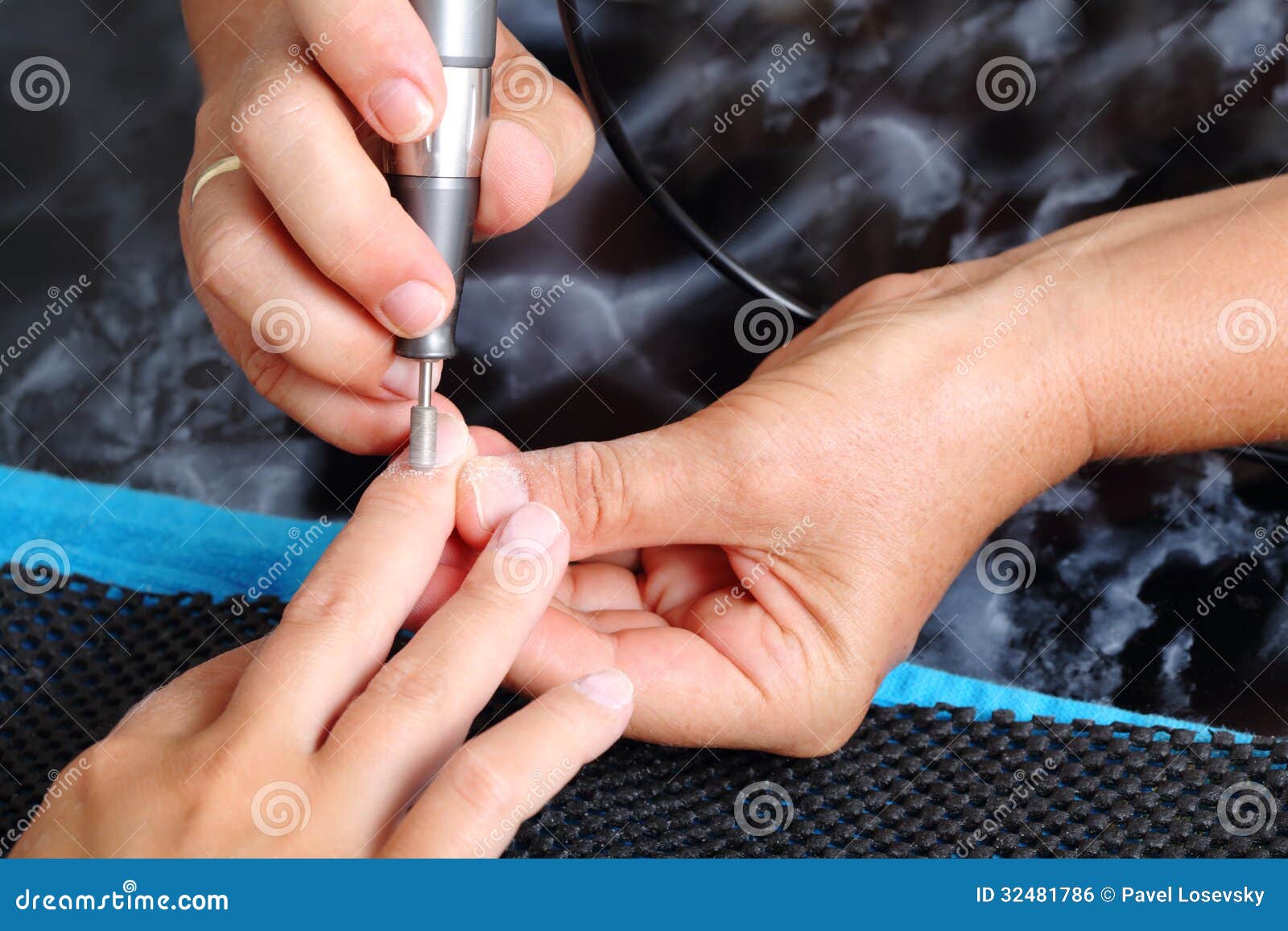 the master uses an electric machine to remove cuticle