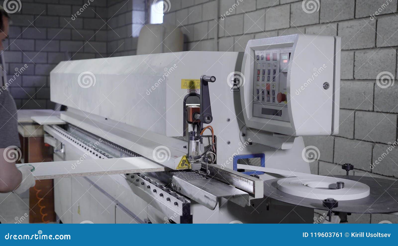 Master is Using Industrial Machine for Processing Edges of Particle