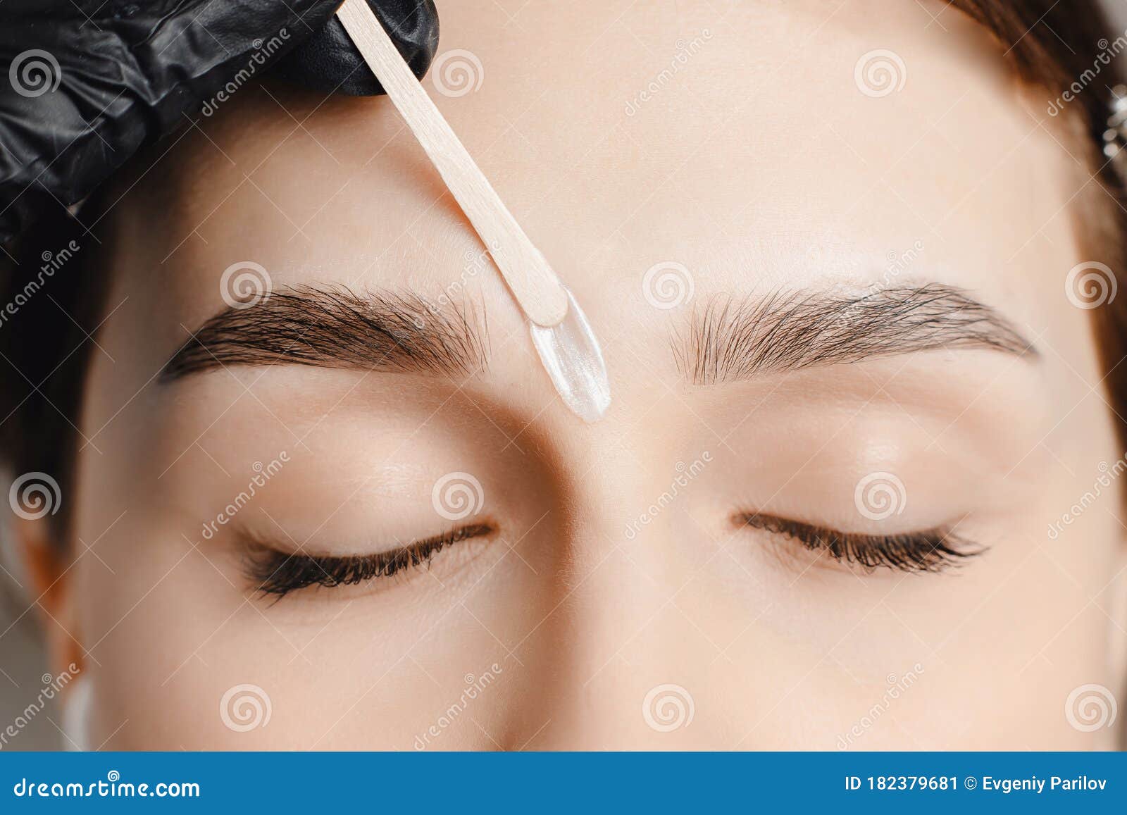 master wax depilation of eyebrow hair in women, brow correction