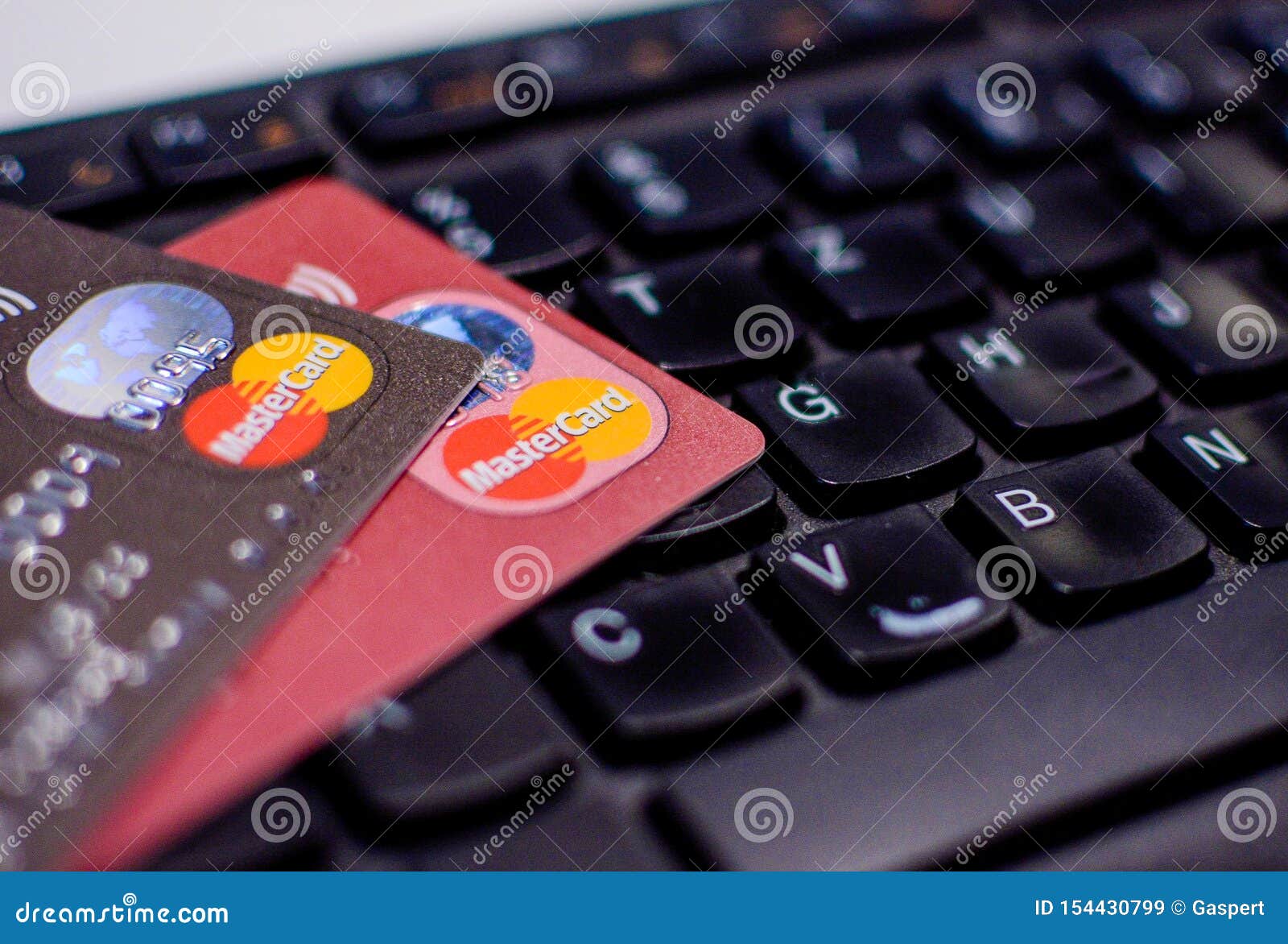 Mastercard Credit Cards on a Keyboard Editorial Stock Image Image of