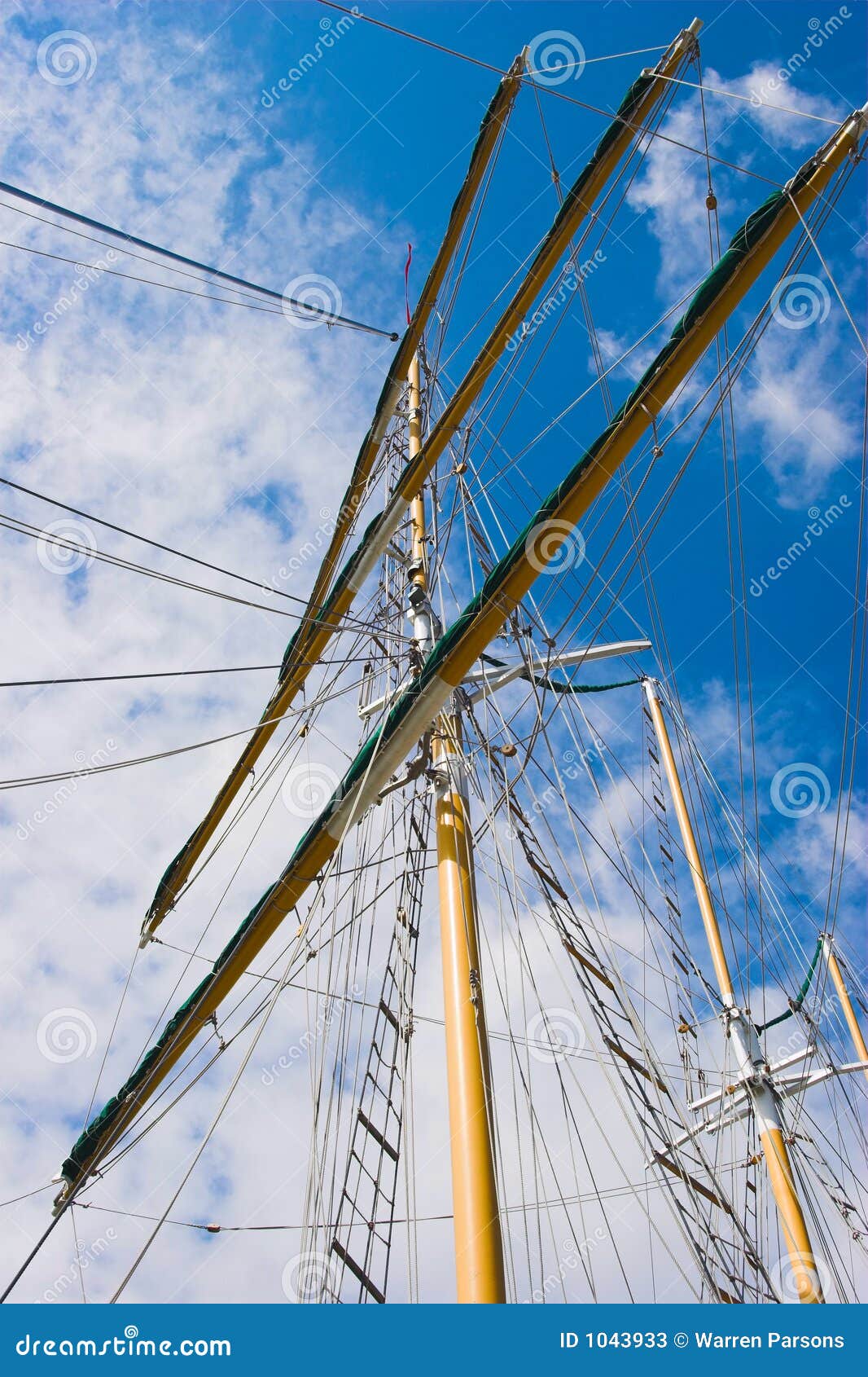 masts against blue sky