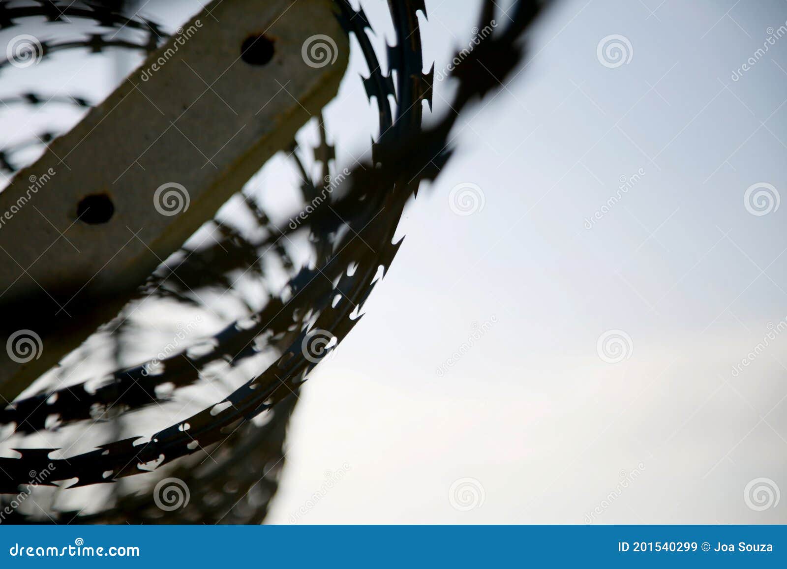 concertina wire fence in industrial area