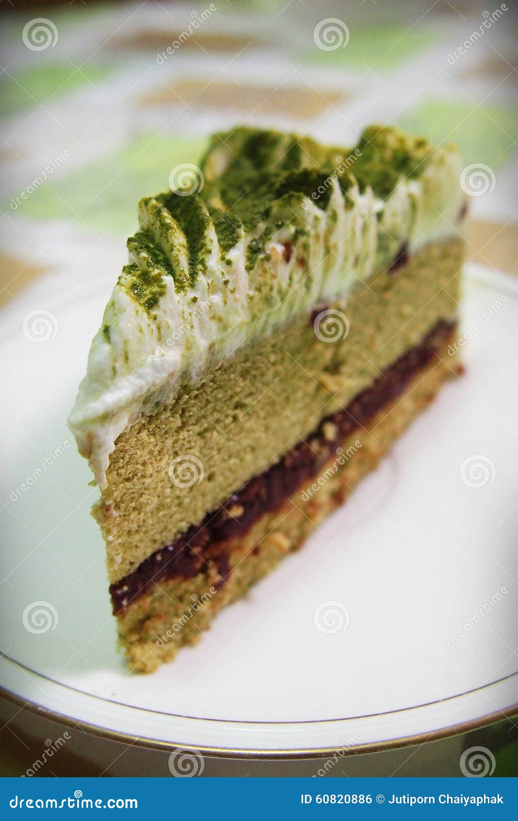 Matcha Green Tea Cake with Whipped Cream and Red Bean Paste Stock Photo