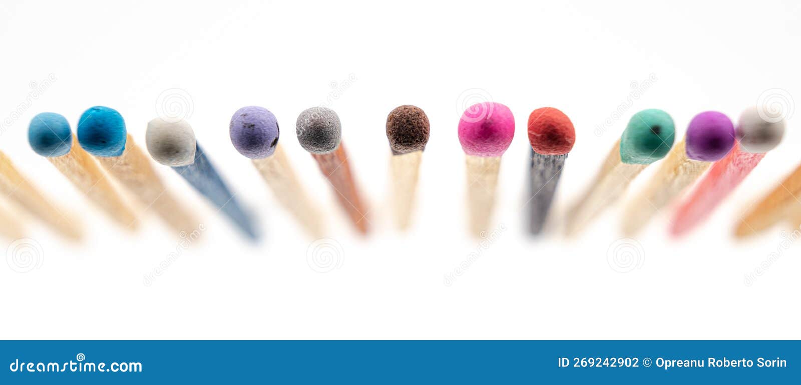 matchsticks various colors on white background